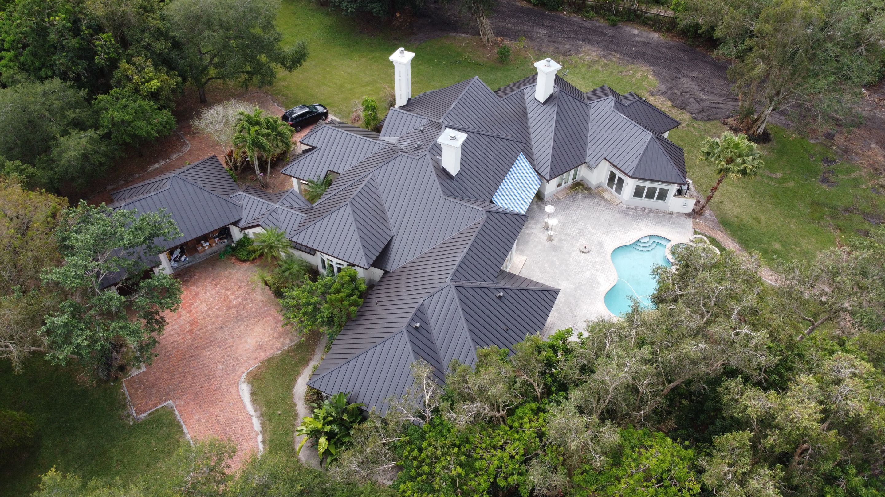 Residential Roofing Installation using 1" Nail strip metal roof by BLUES BROTHERS ROOFING