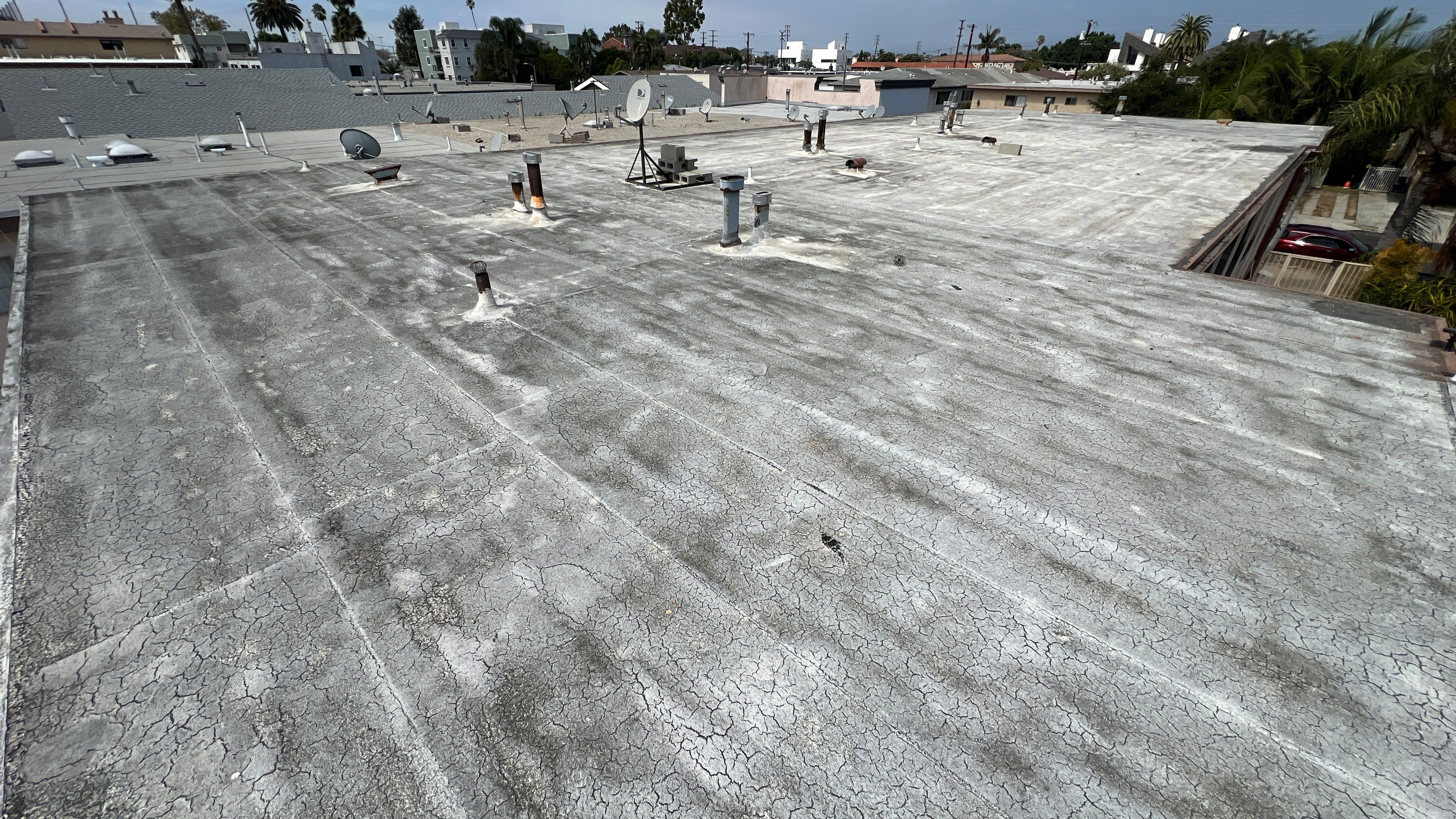 Commercial Roofing Installation using Silicone Coating by Hull Brothers Roofing