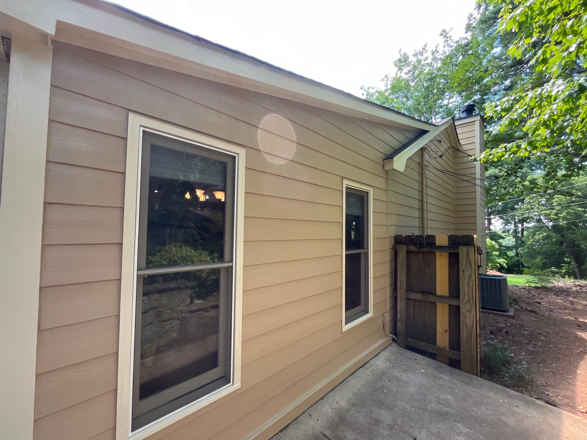 Rotted Wood Replacement, Deck Stain, and Exterior Paint Project in Kennesaw, GA by Nelson Exteriors 