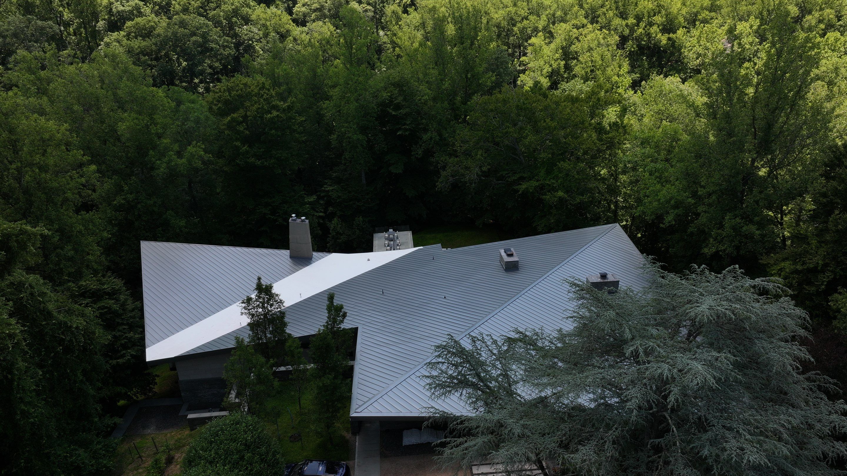 Modern Standing Seam Metal Roof Installation in McLean by American Home Contractors