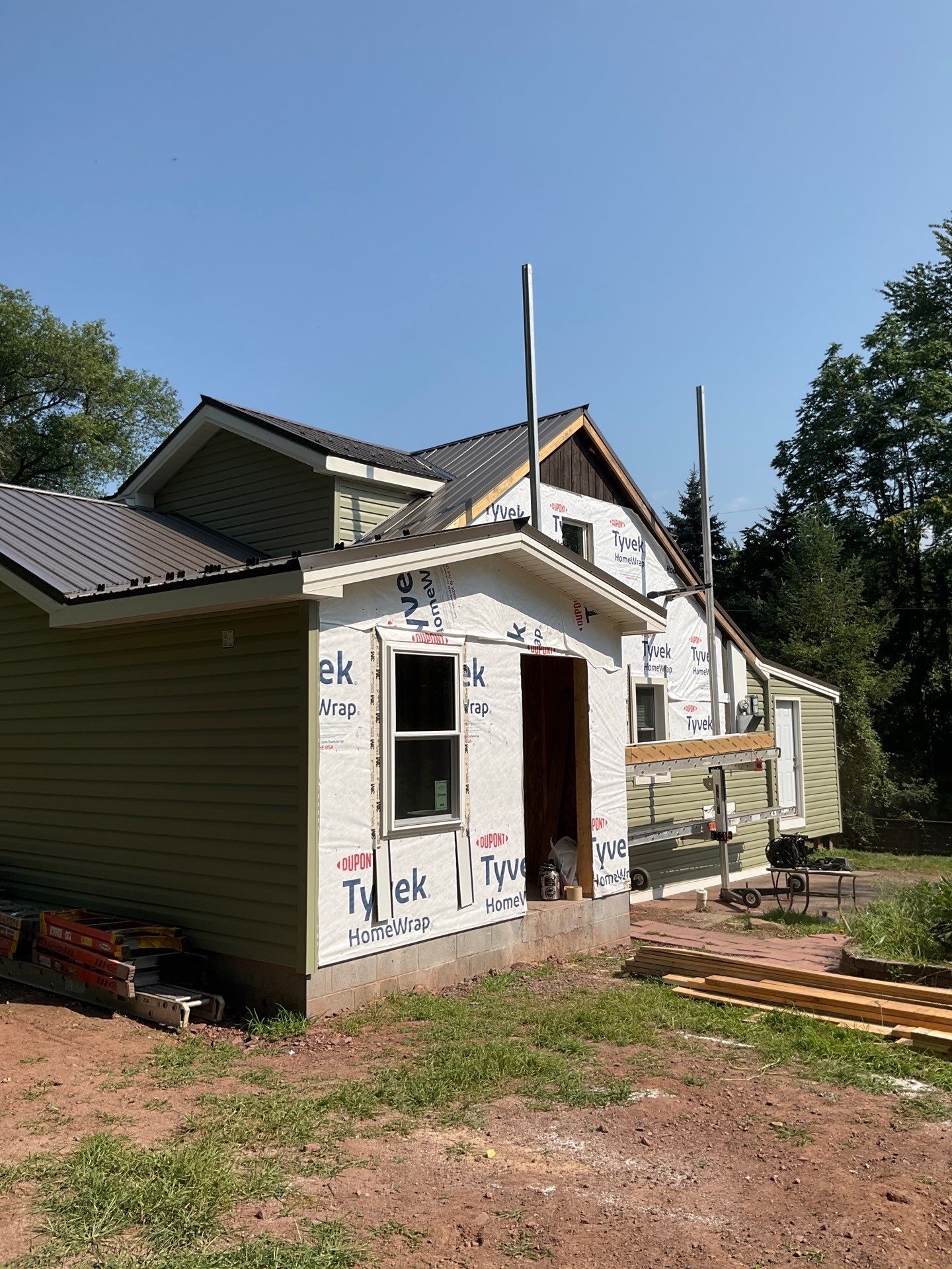 Whole-Home Exterior Transformation and Addition in Halifax by Esh Builders