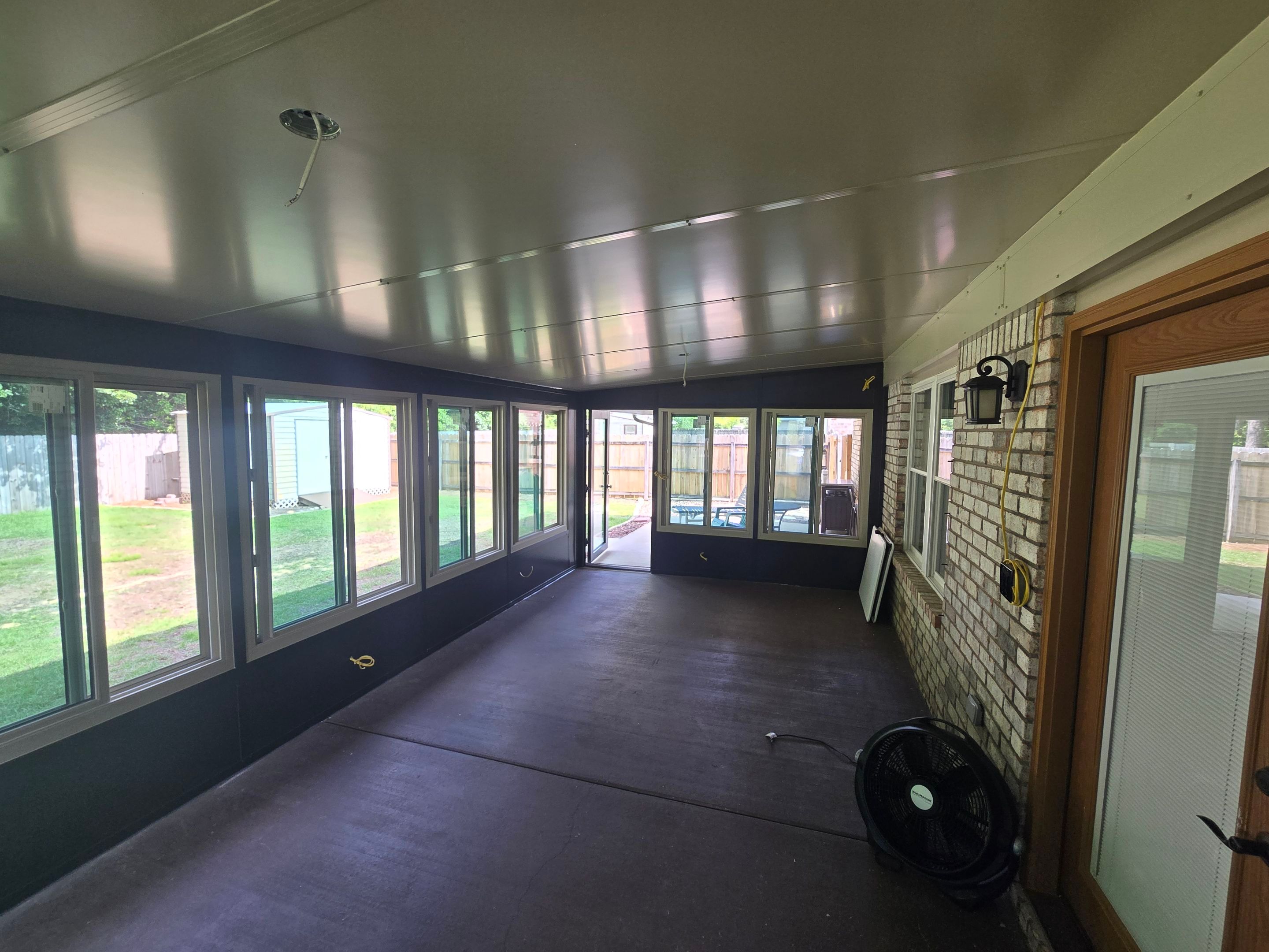 Glass Room & Patio Cover using Colorbeam by Titan Sunrooms