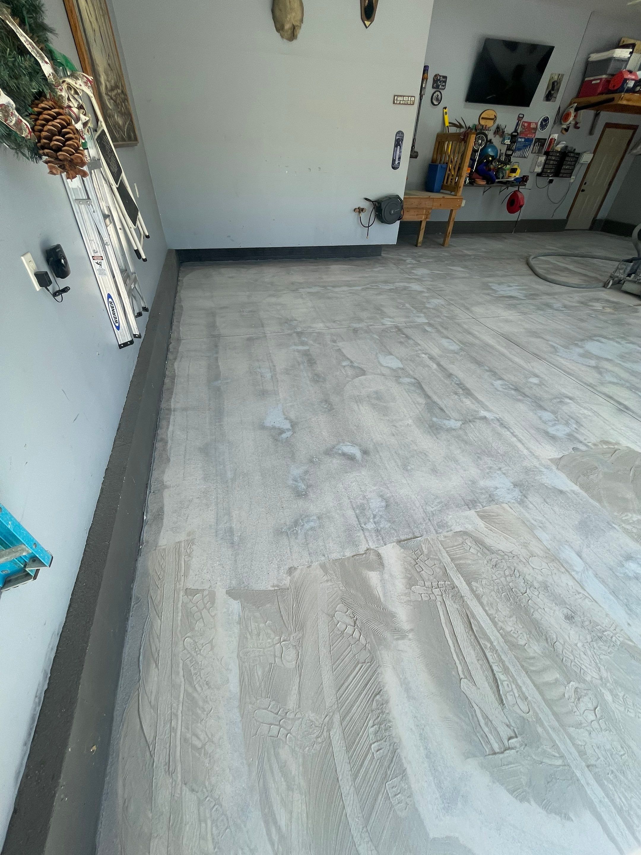 Residential Garage Floor Coating in Sioux Falls by Select Painting, Coatings & Garage Cabinets