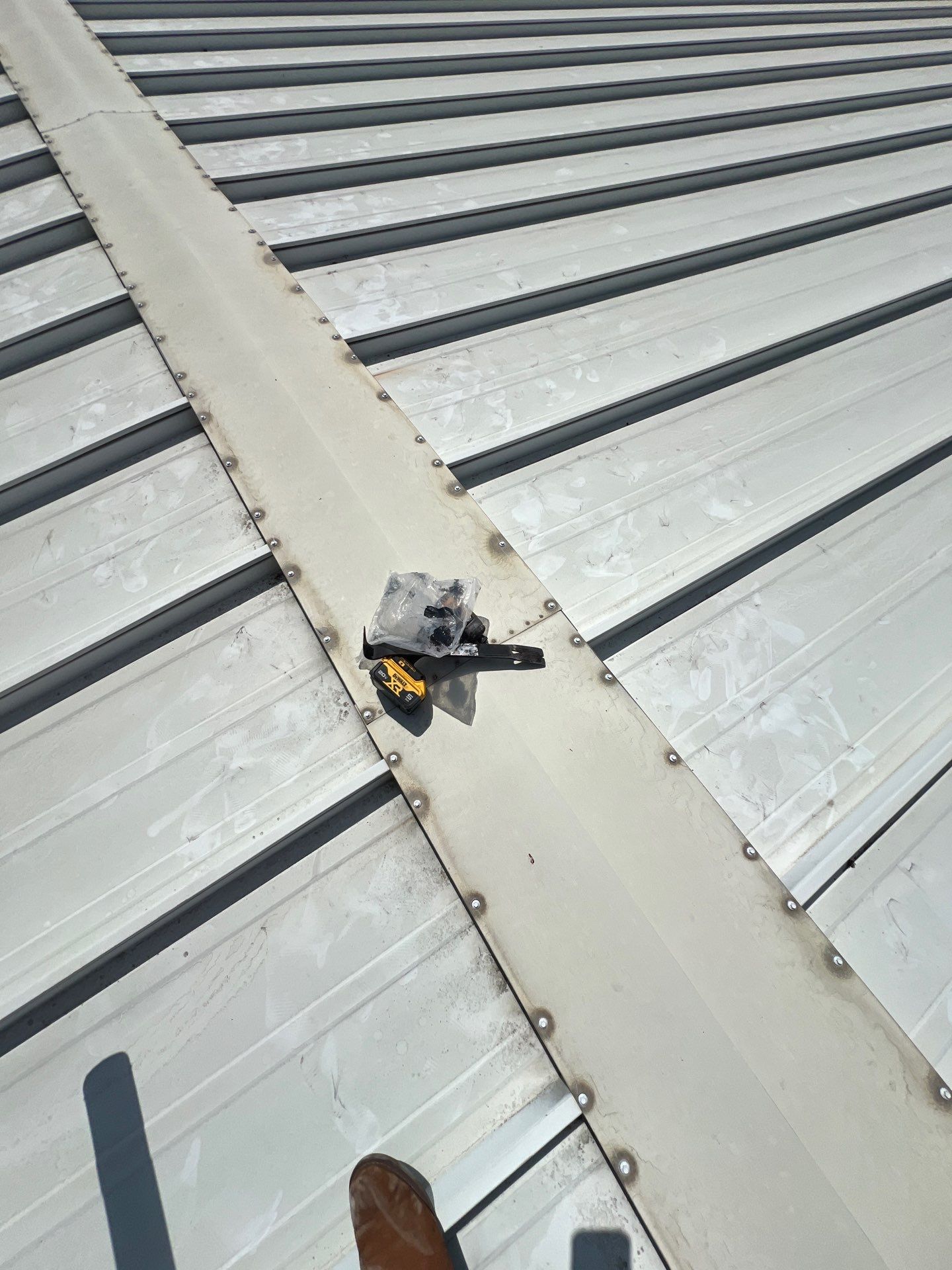 Commercial Roofing Repair using Metal by Roof Repair Company