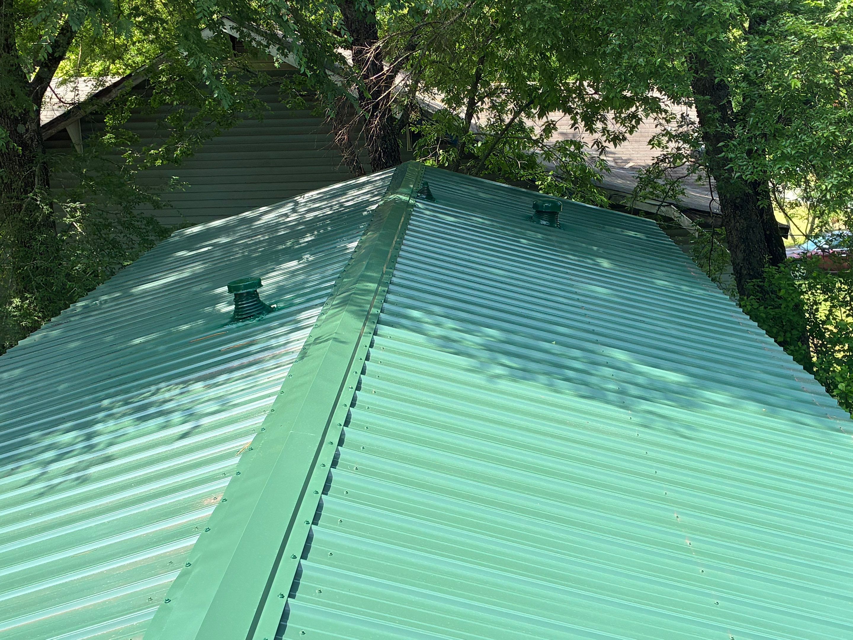 Metal roof installation by In & Out Construction & Remodeling, LLC