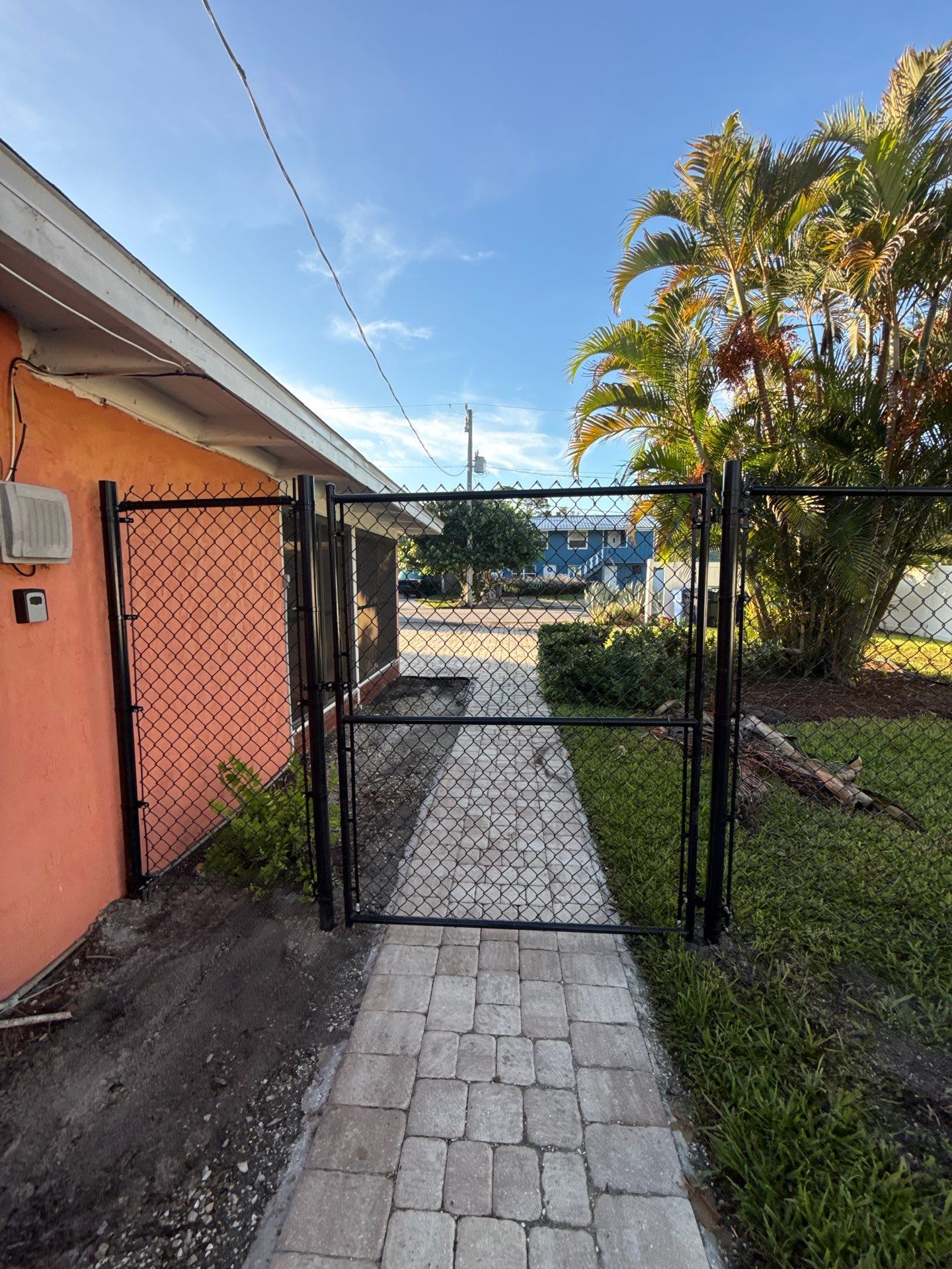 Black Chain Link Fence Installation and Site Clearing in Nokomis by True Fence LLC
