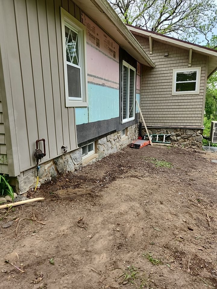 Deck installation using cable railing. by Burke Home Services