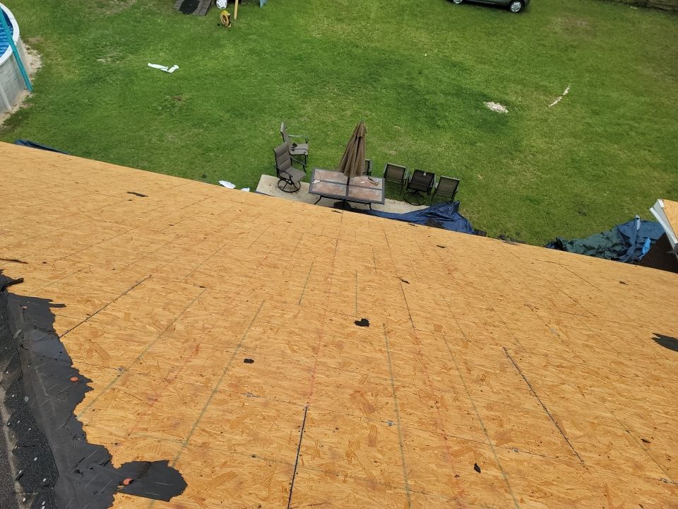 Residential Roofing Installation using Roof Replacement by American Roofing & Construction LLC