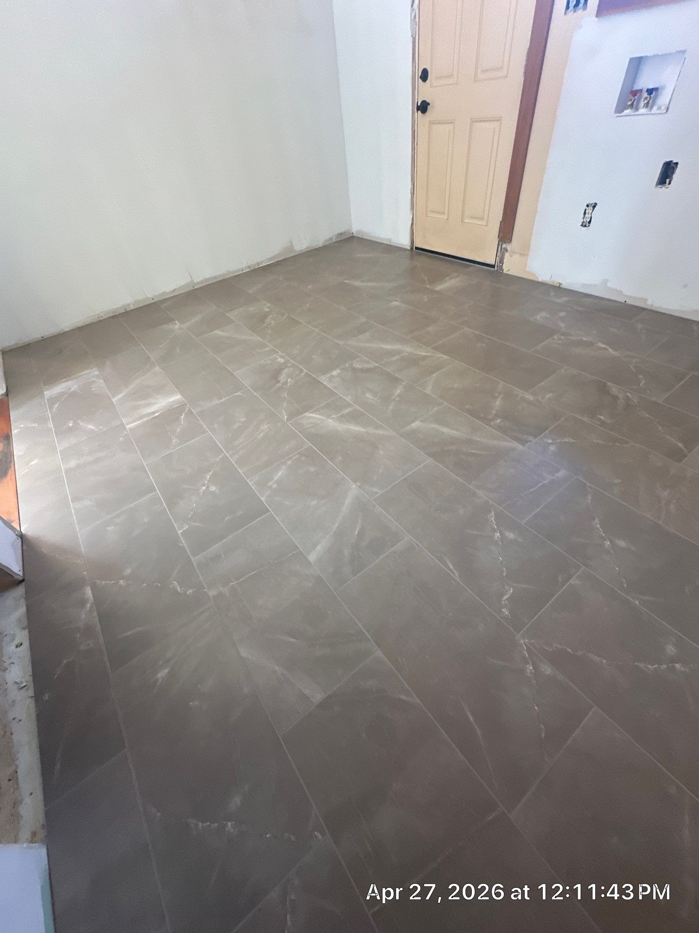 Mudroom and dog wash tile project by Renovatic LLC