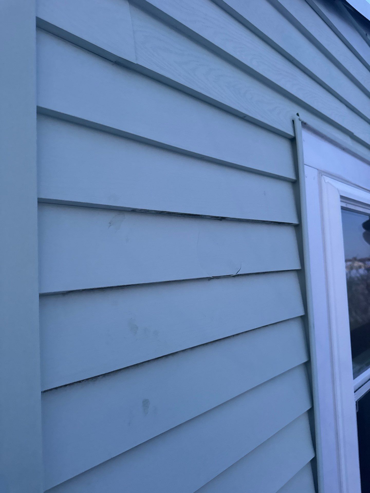 Vinyl Siding Repair & Replacement in Lowell, MA by Mighty Dog Roofing of Greater Middlesex County