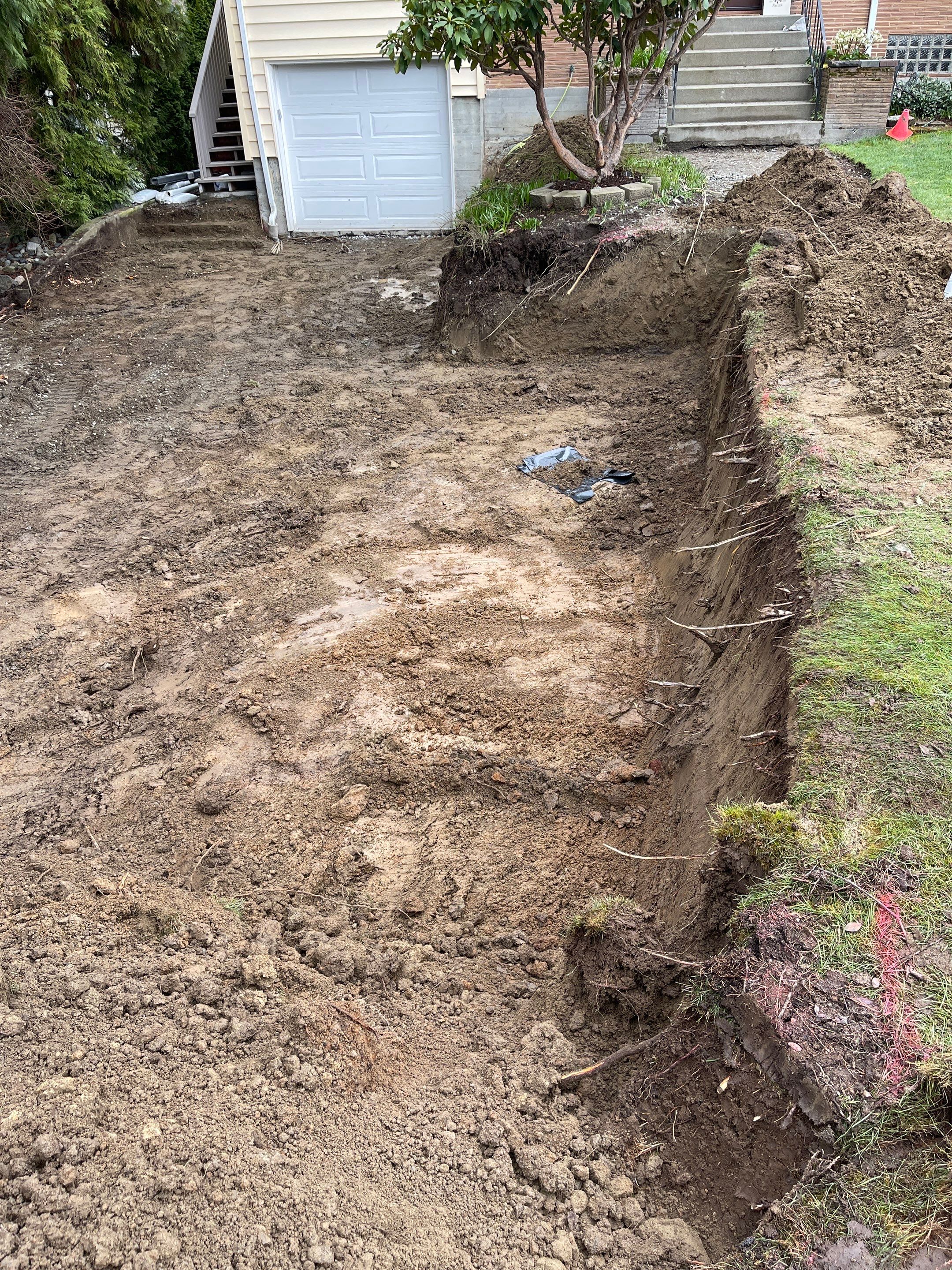 Lorra | Asphalt Driveway Repair & Retaining Wall by Jireh Asphalt & Concrete Inc 