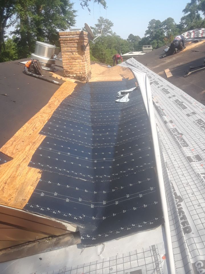 Commercial Roofing Installation using Roof Replacement by American Roofing & Construction LLC