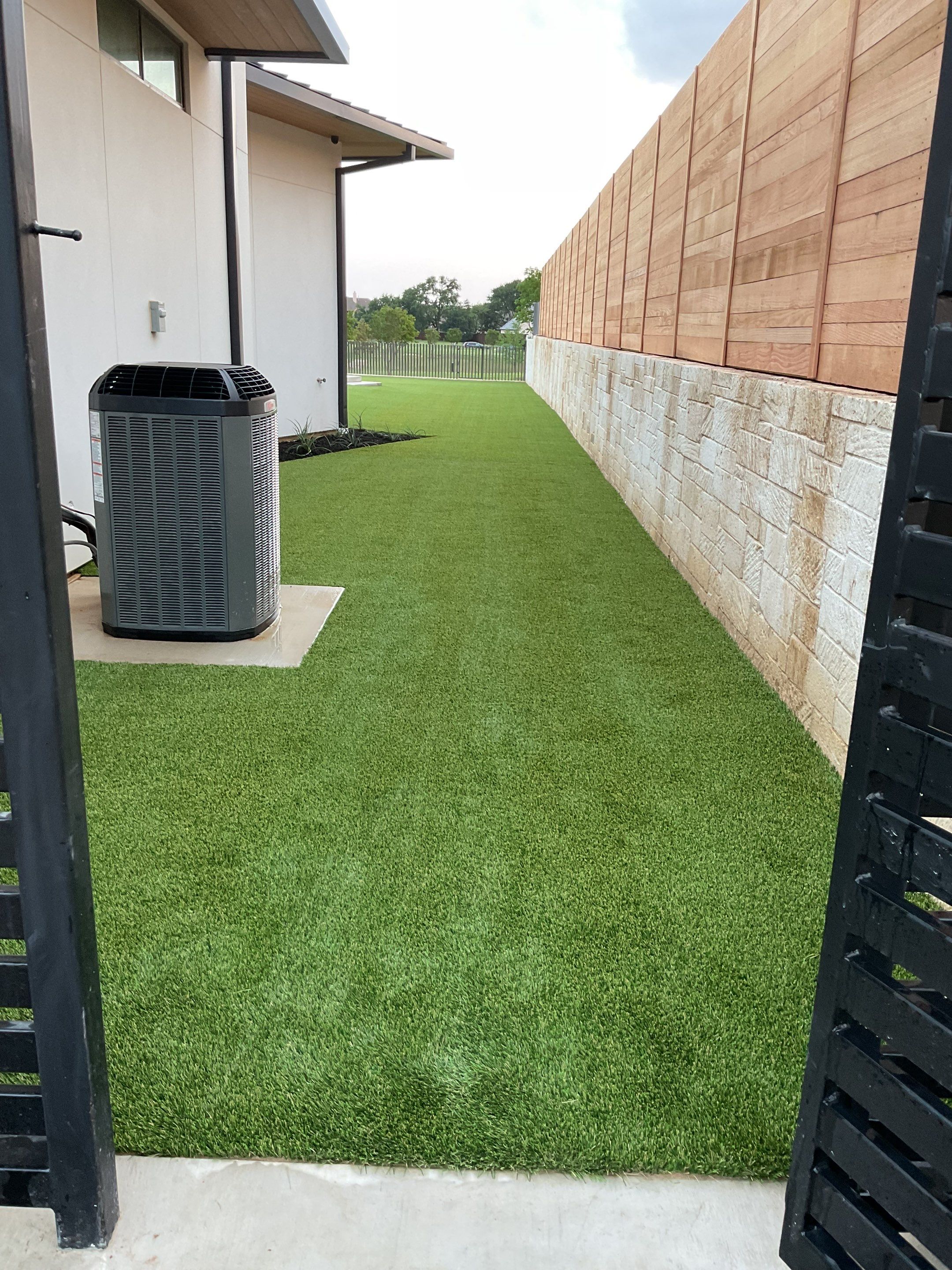 Synthetic Turf Installation using Texas Rye by Turf Concepts