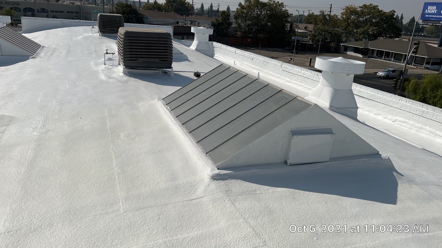 Polyurethane foam roof refurbish and recoating by Straight Edge Roofing Inc