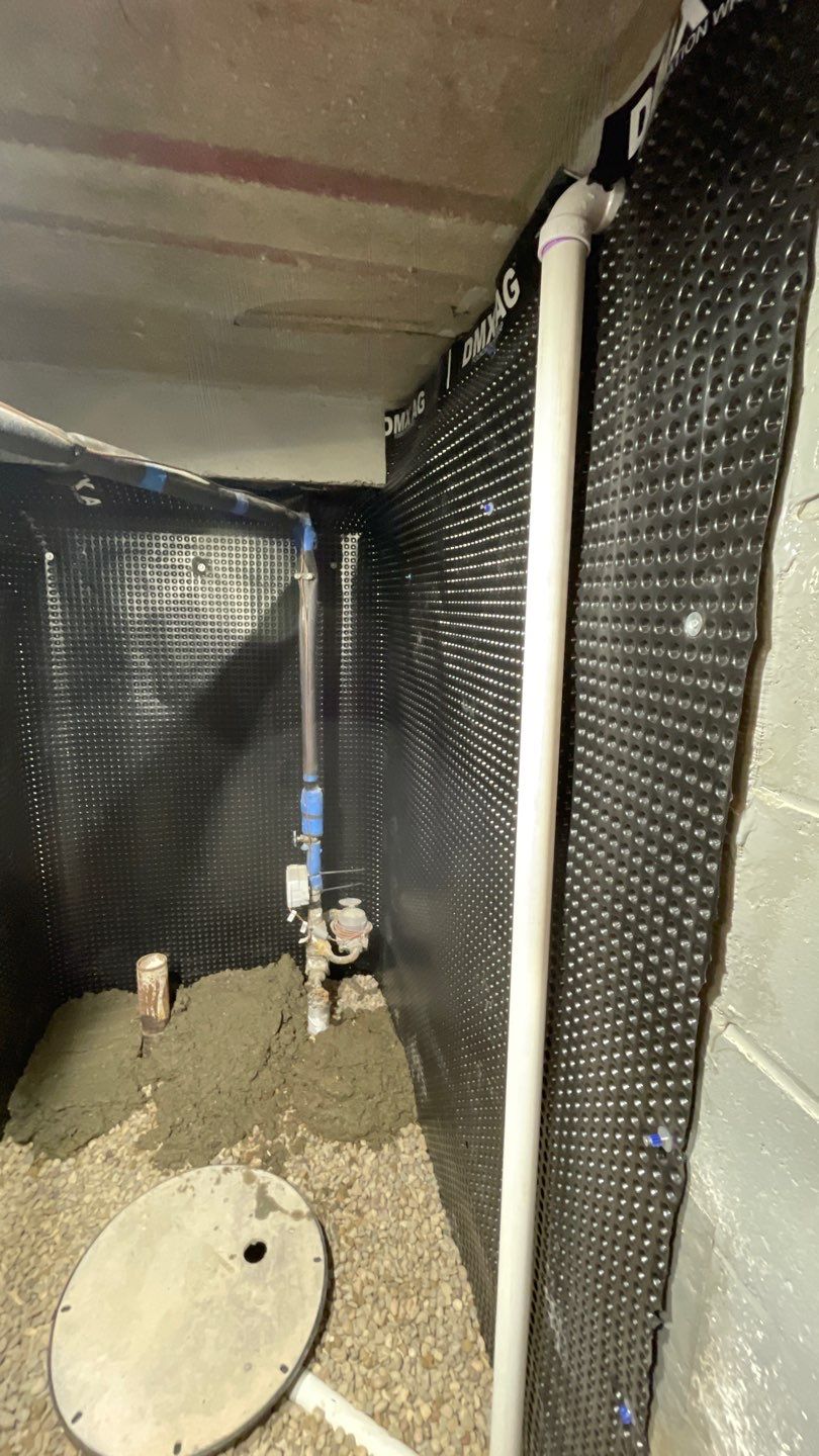 Interior Drain Tile & Sump Pump System in West Minneapolis by Waterproofing Northeast