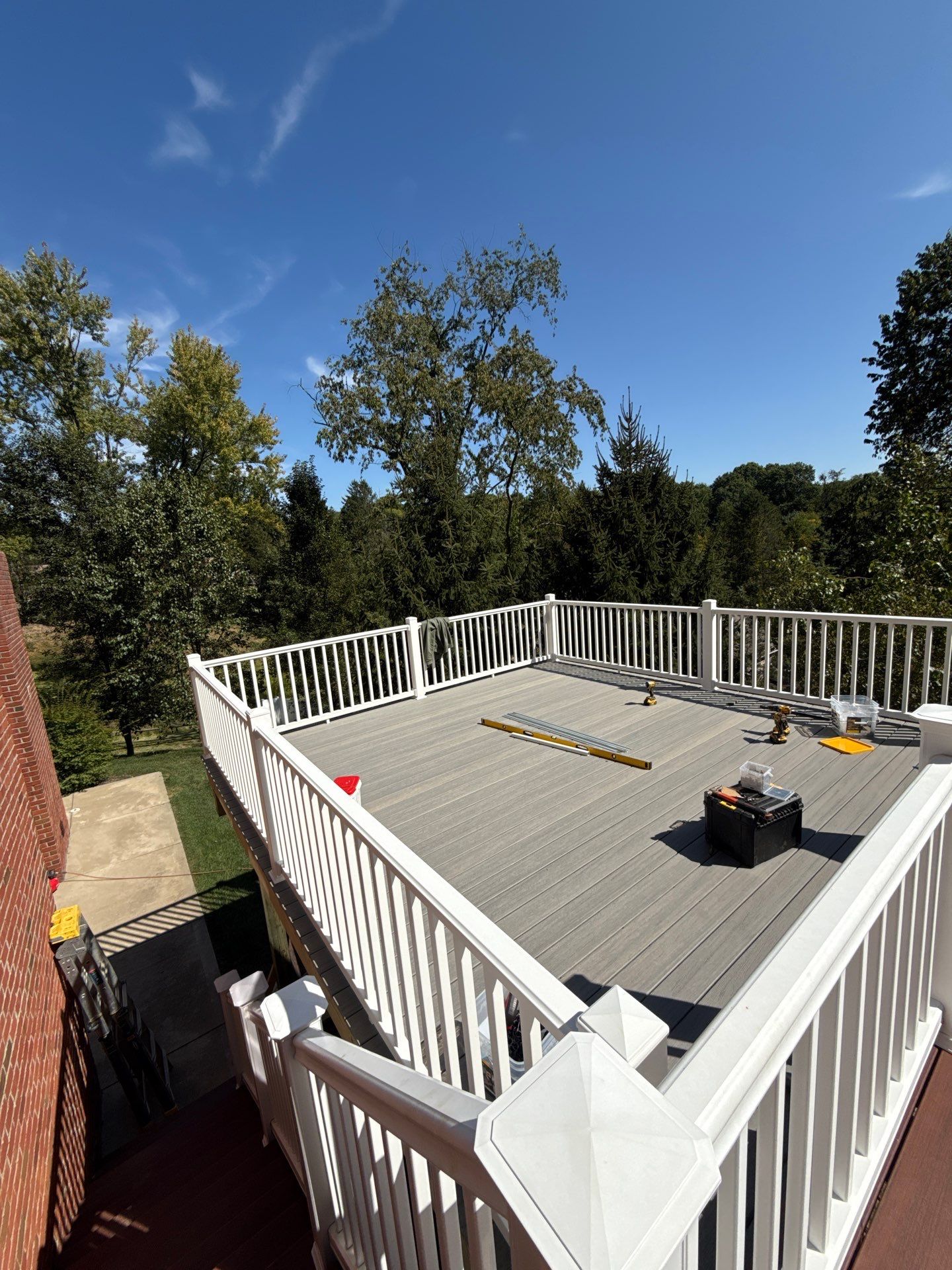 Deck extension  by Cousins Roofing Siding & Decks