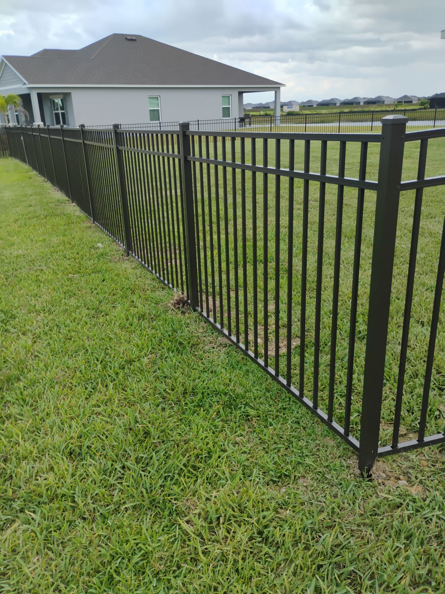 Black Aluminum Picket Fence Installation for Punta Gorda Residence by True Fence LLC
