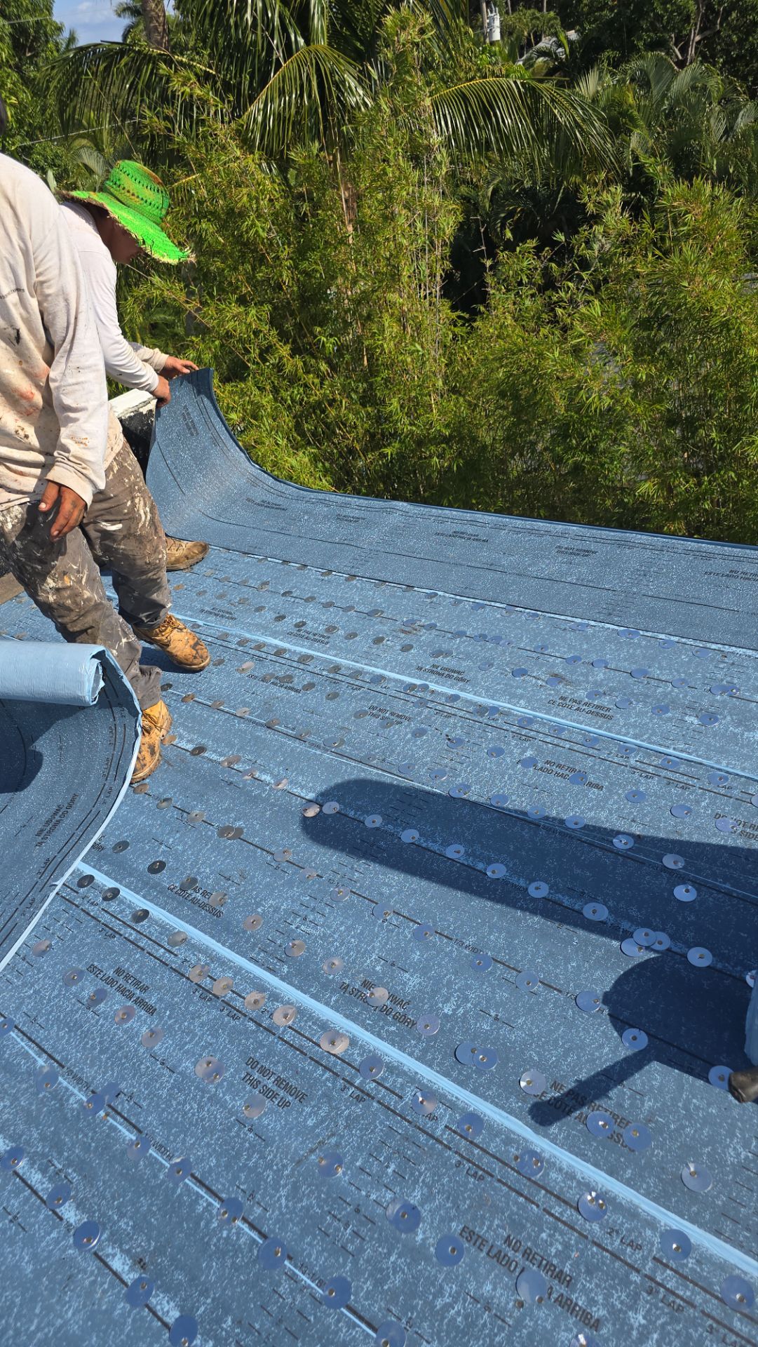 West Palm Beach Roof Restoration and Travertine Paver Driveway Installation by Aastro Roofing