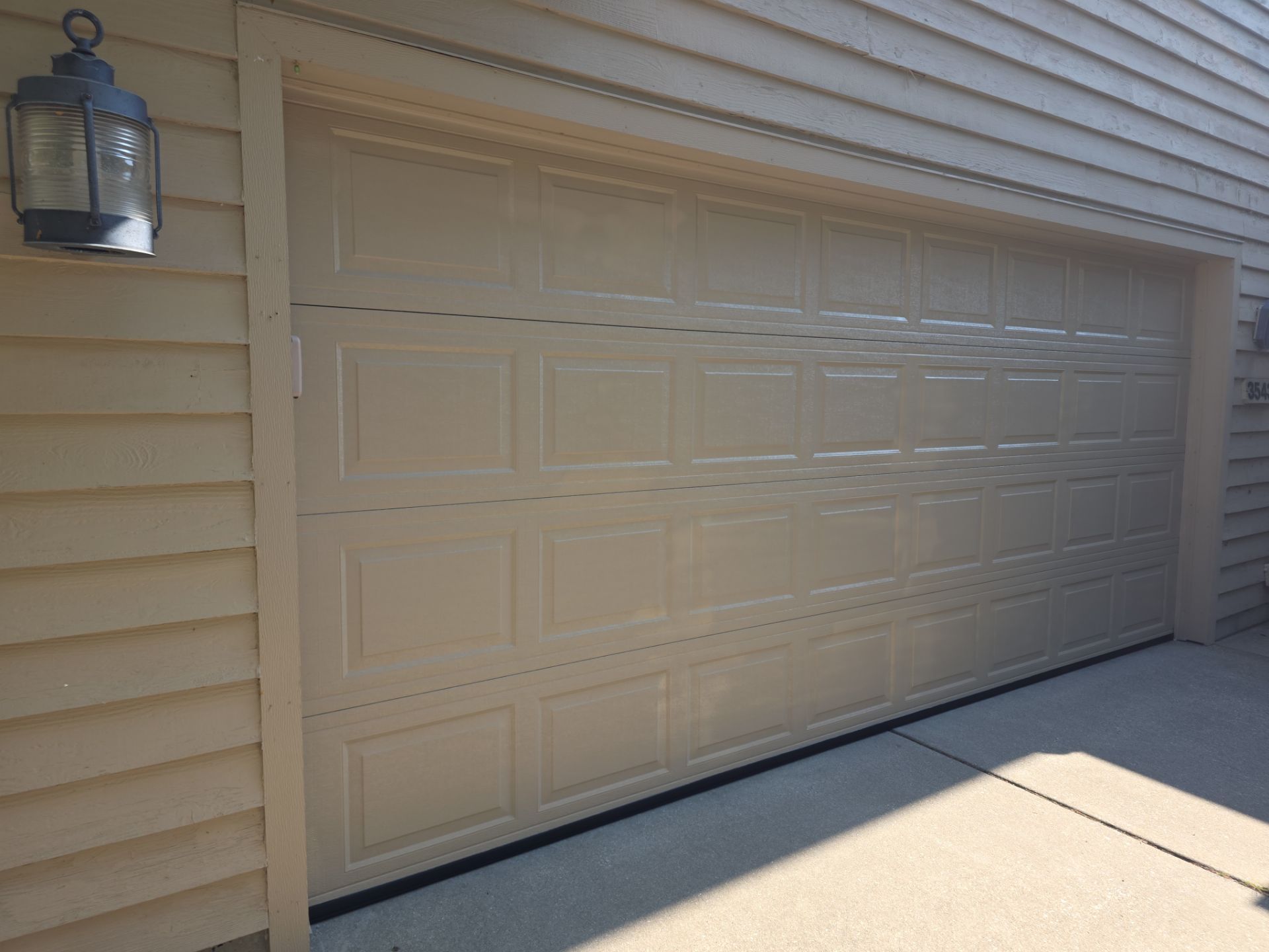 Residential Garage Door Repaint In Muskegon Michigan! by Gordon Painting