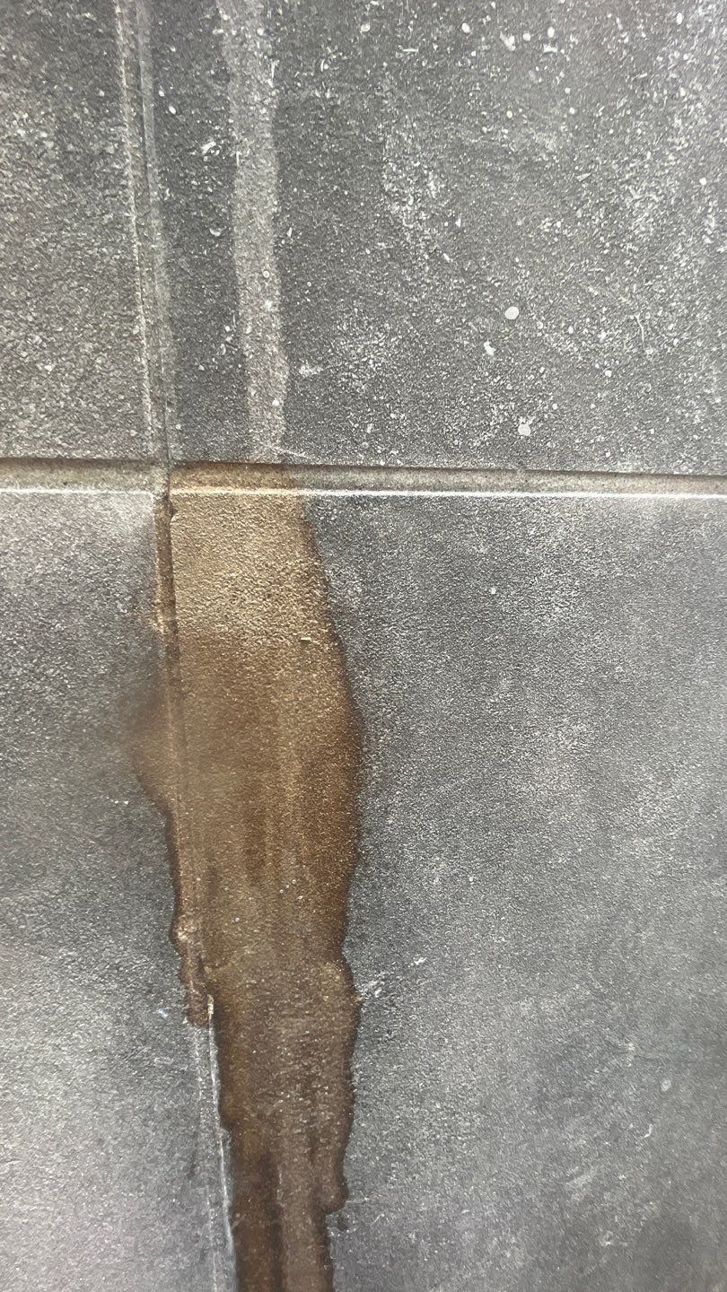 Courtyard pressure washing difficult access.  by Northern Power Washing LLC.
