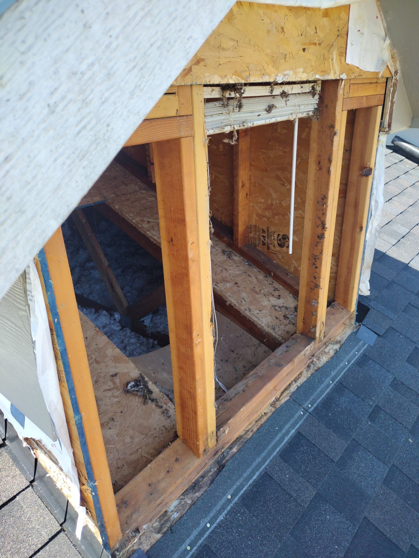 Glacier Roof Replacement with Metal Accents by Orezona Building & Roofing Company, Inc.