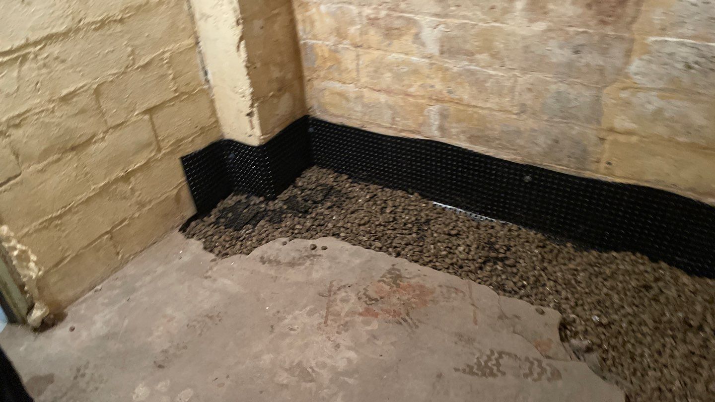 Interior Drain Tile for a South Minneapolis Basement by Waterproofing Northeast