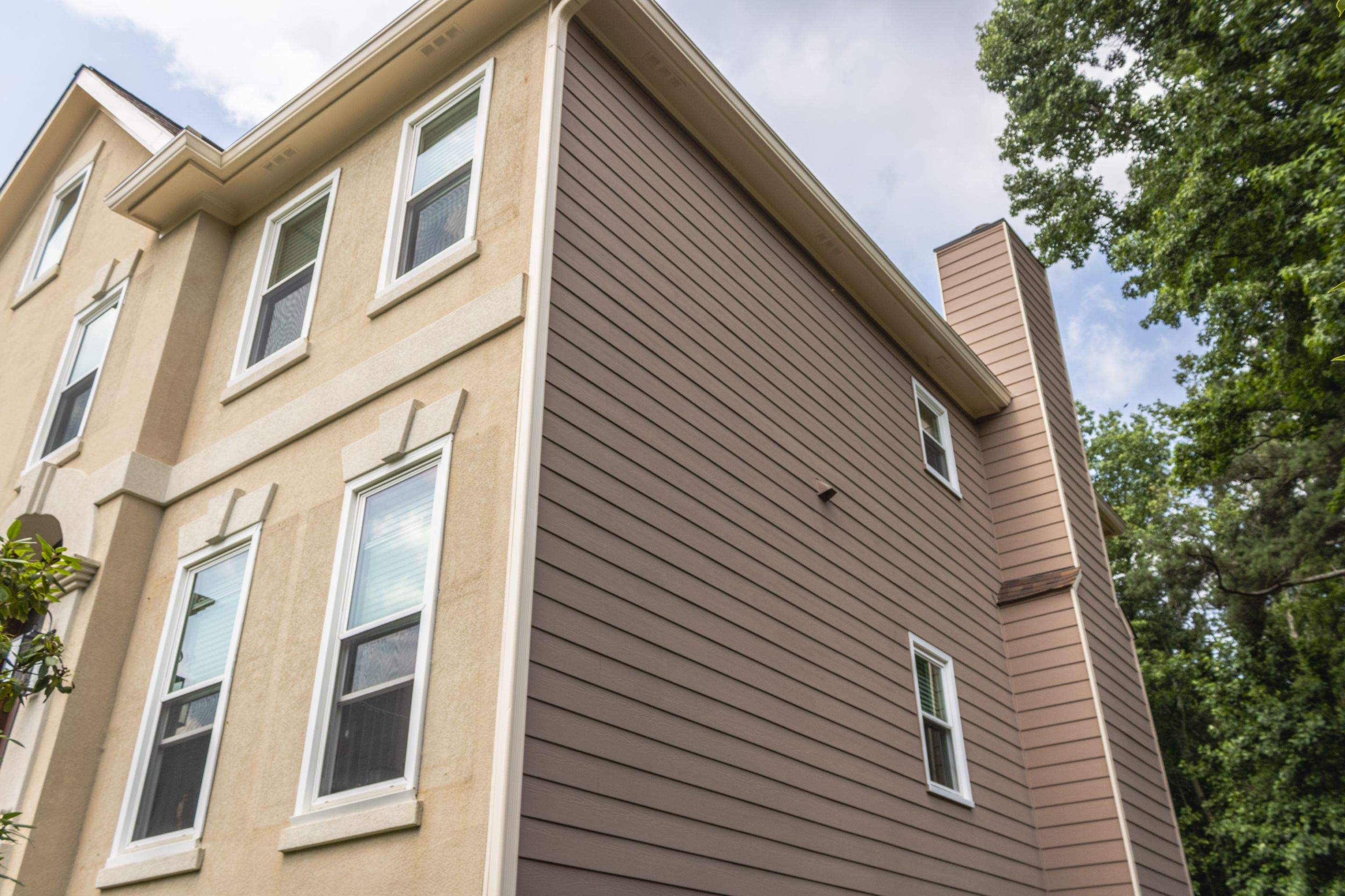 Exterior Painting using Sherwin-Williams and Rotted Wood Replacement by Nelson Exteriors 