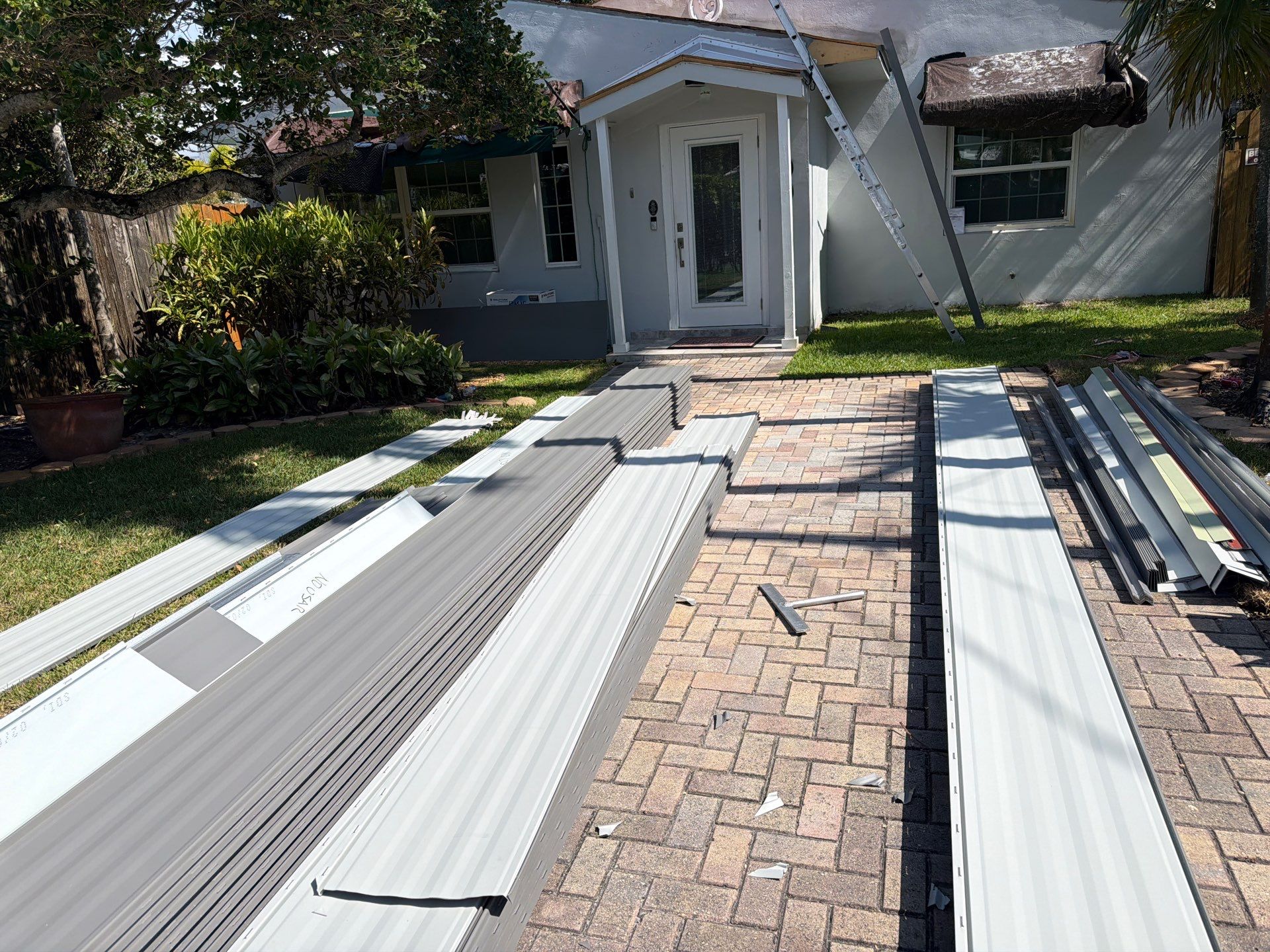 Residential Roofing Installation using 1" Nail strip metal roof by BLUES BROTHERS ROOFING