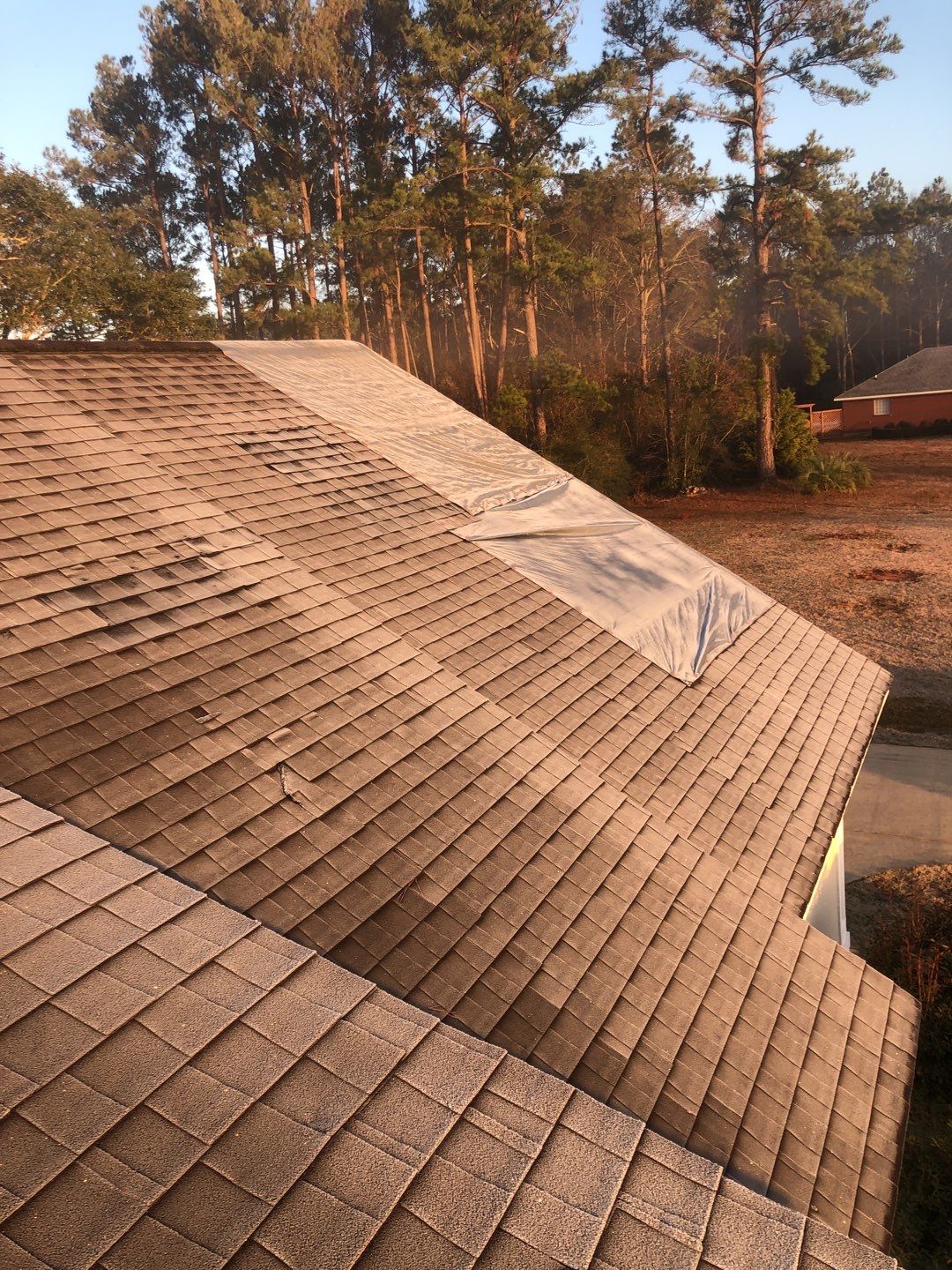 Residential Roofing Installation using Roof Replacement by American Roofing & Construction LLC