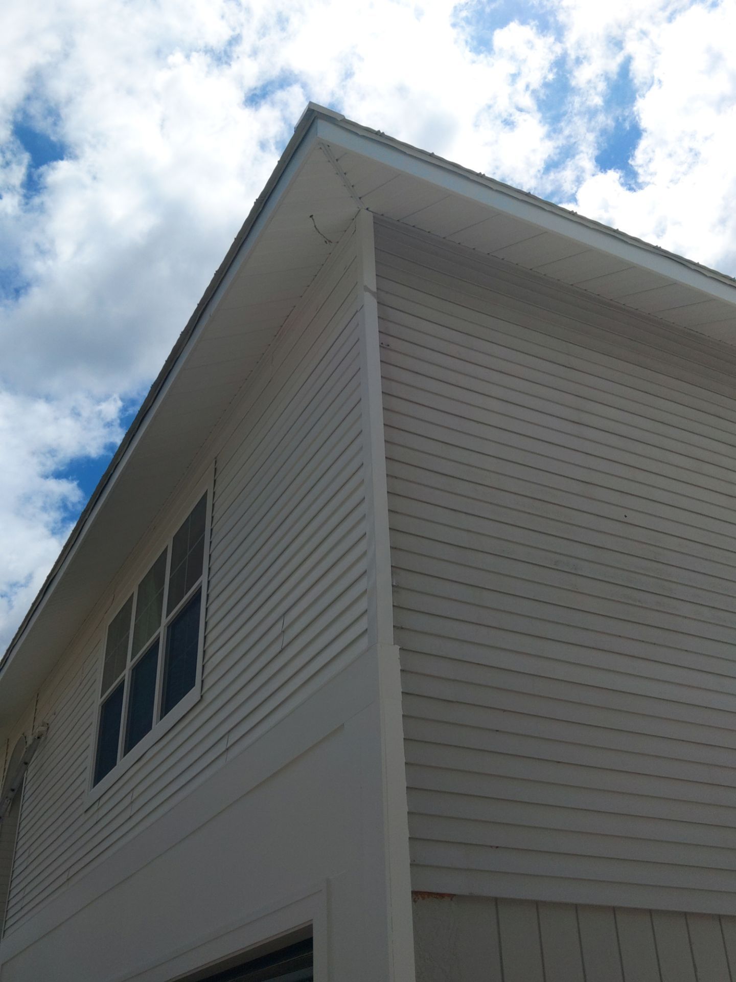 Complete Gutter System with Downspouts & Guards in Fort Myers Beach FL by Gutter Professors