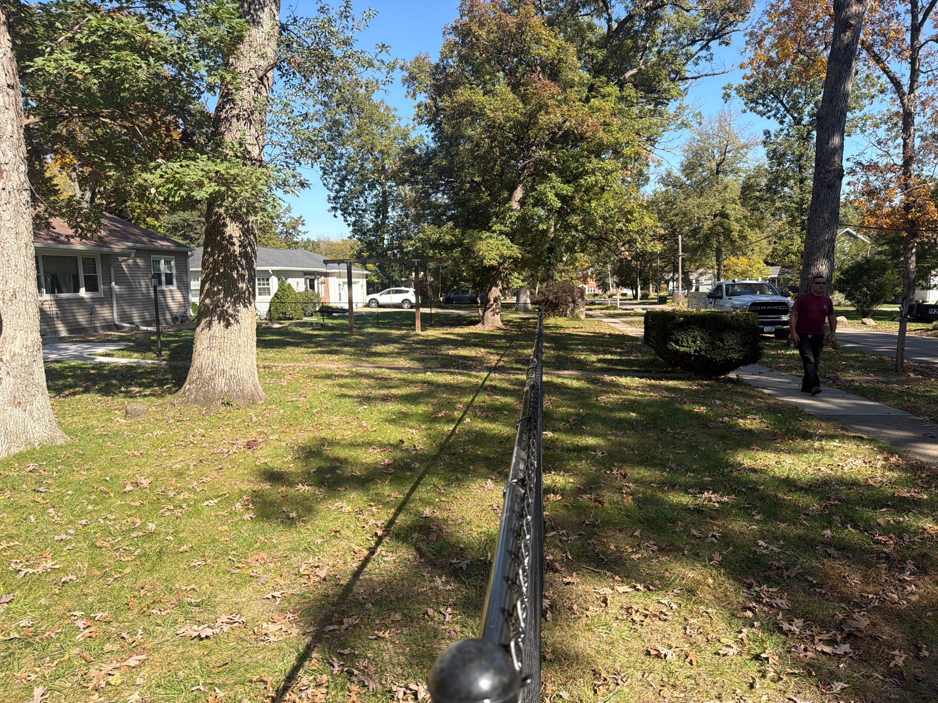 Residential Black Chain Link Fencing in Cedar Falls by Perfect Picket Fence and Stain