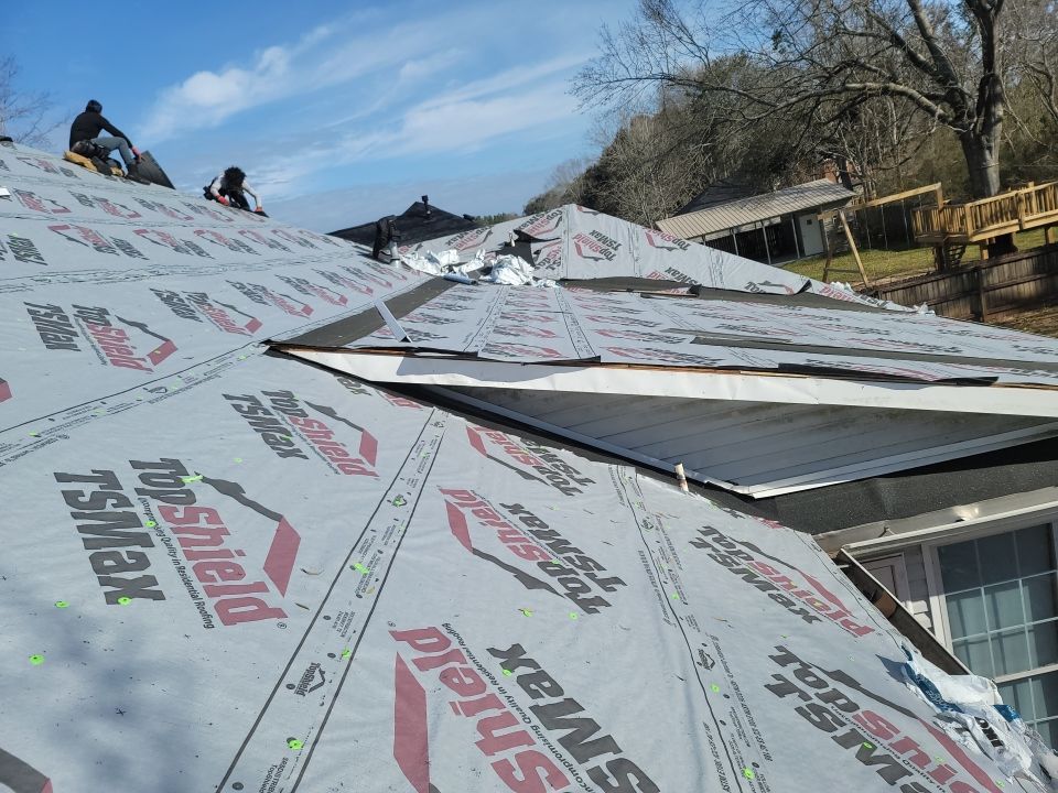 Residential Roofing Installation using Roof Replacement by American Roofing & Construction LLC