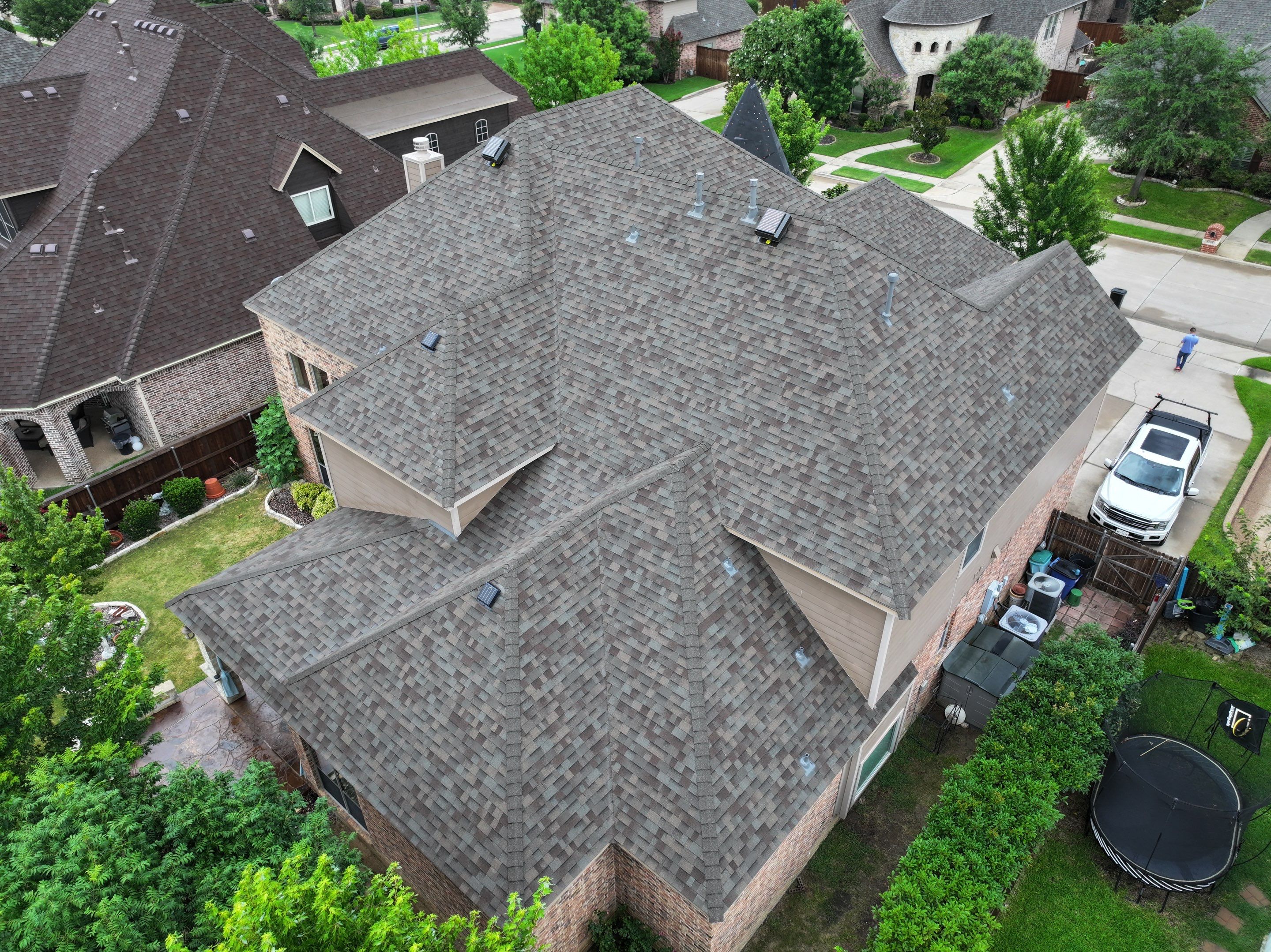 Installing Custom copper turret and Malarkey Vista Class 4 shingles Hail Damage Upgrade by Becker Roofing and Exteriors