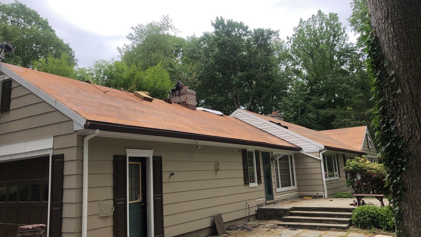 Commercial Roofing Installation using Owens Corning Duration Driftwood by A Plus Exterior