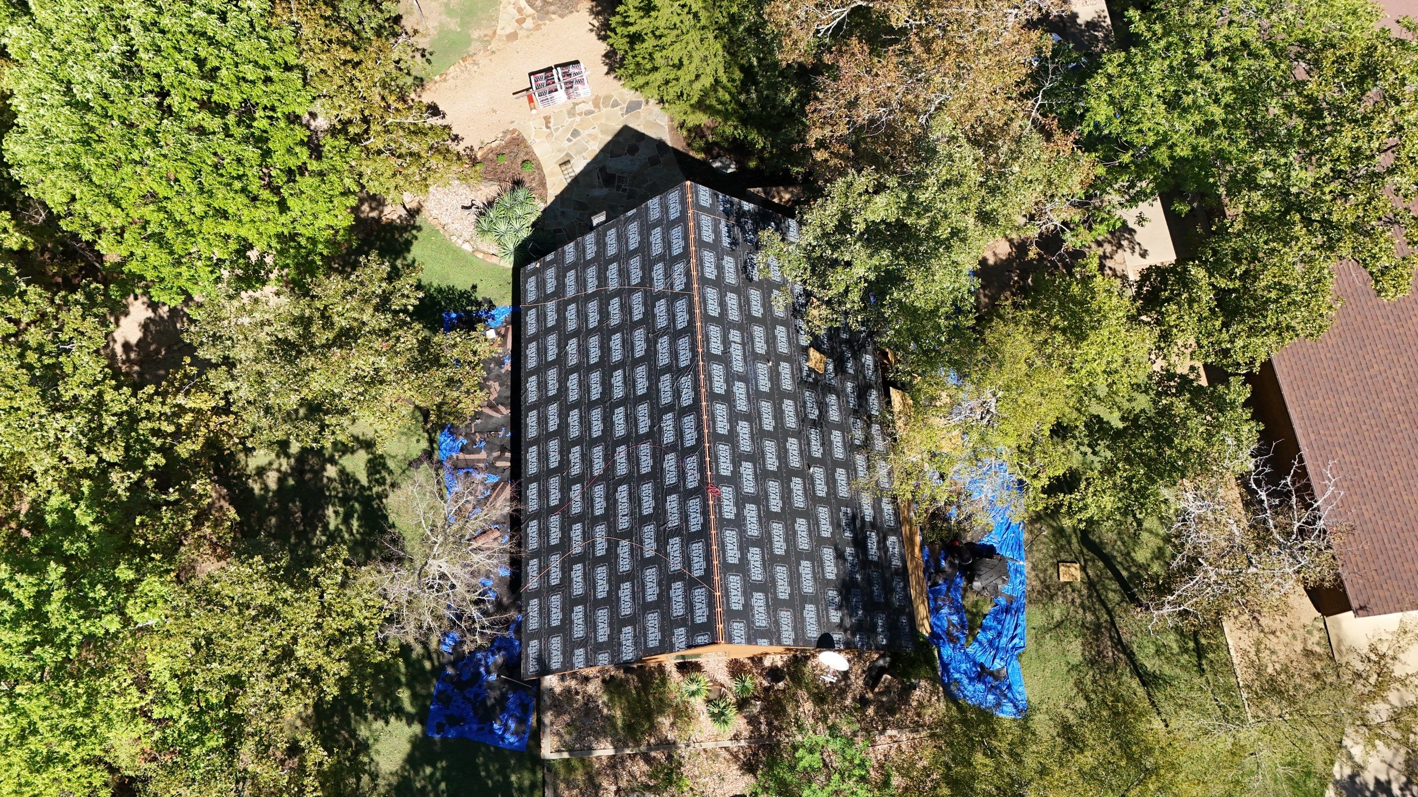 Multi-Building Log Cabin Roof Replacement with Architectural Shingles in Quitman by Armor Roofing | Exteriors