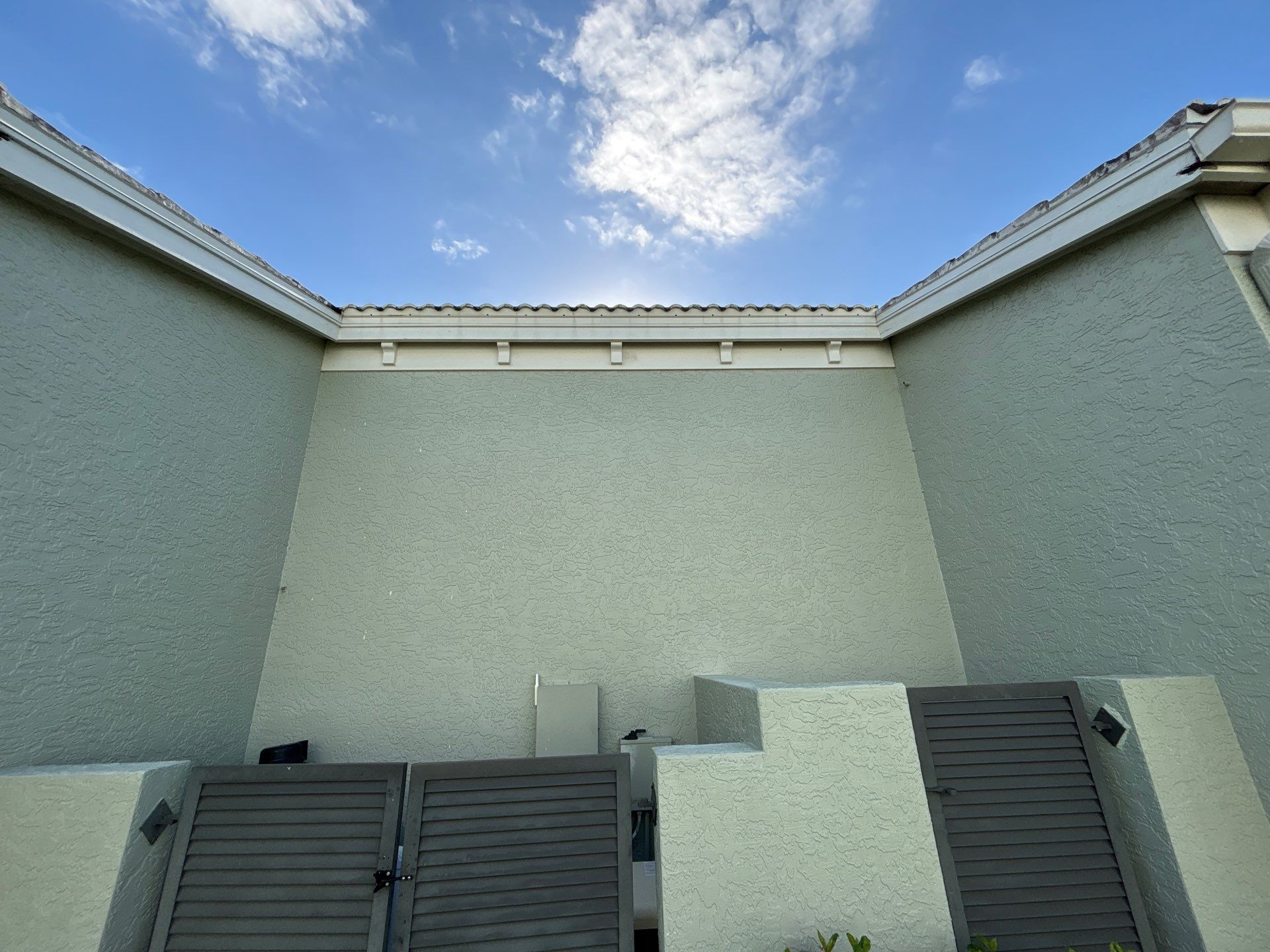 Splash Guard Gutters for Coastal Homes in Longboat Key FL by Gutter Professors