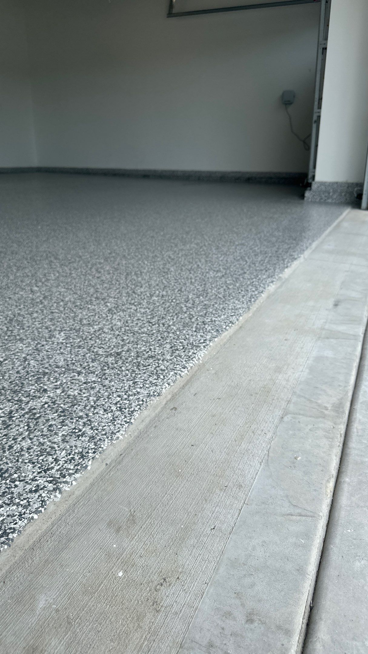 Stonhenge flake floors just look great. Wow!!! by Banner Garage