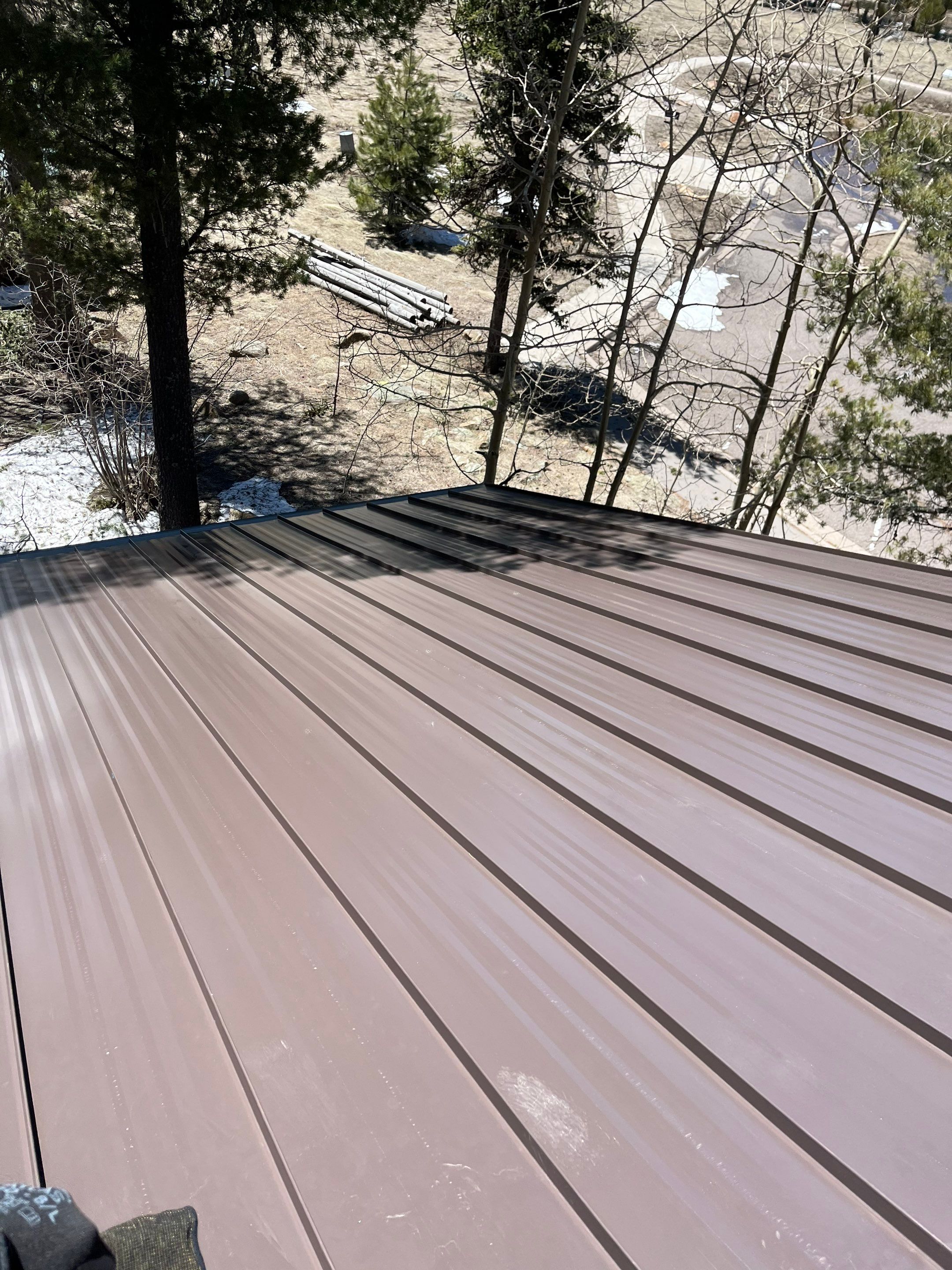 Burnished Slate Standing Seam by Reimagine Roofing