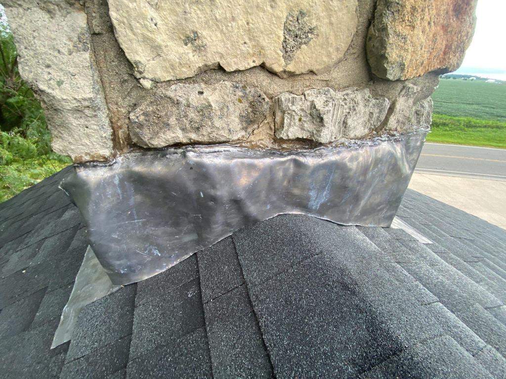 Storm damage roof replacement by Nitro Roofing and Construction