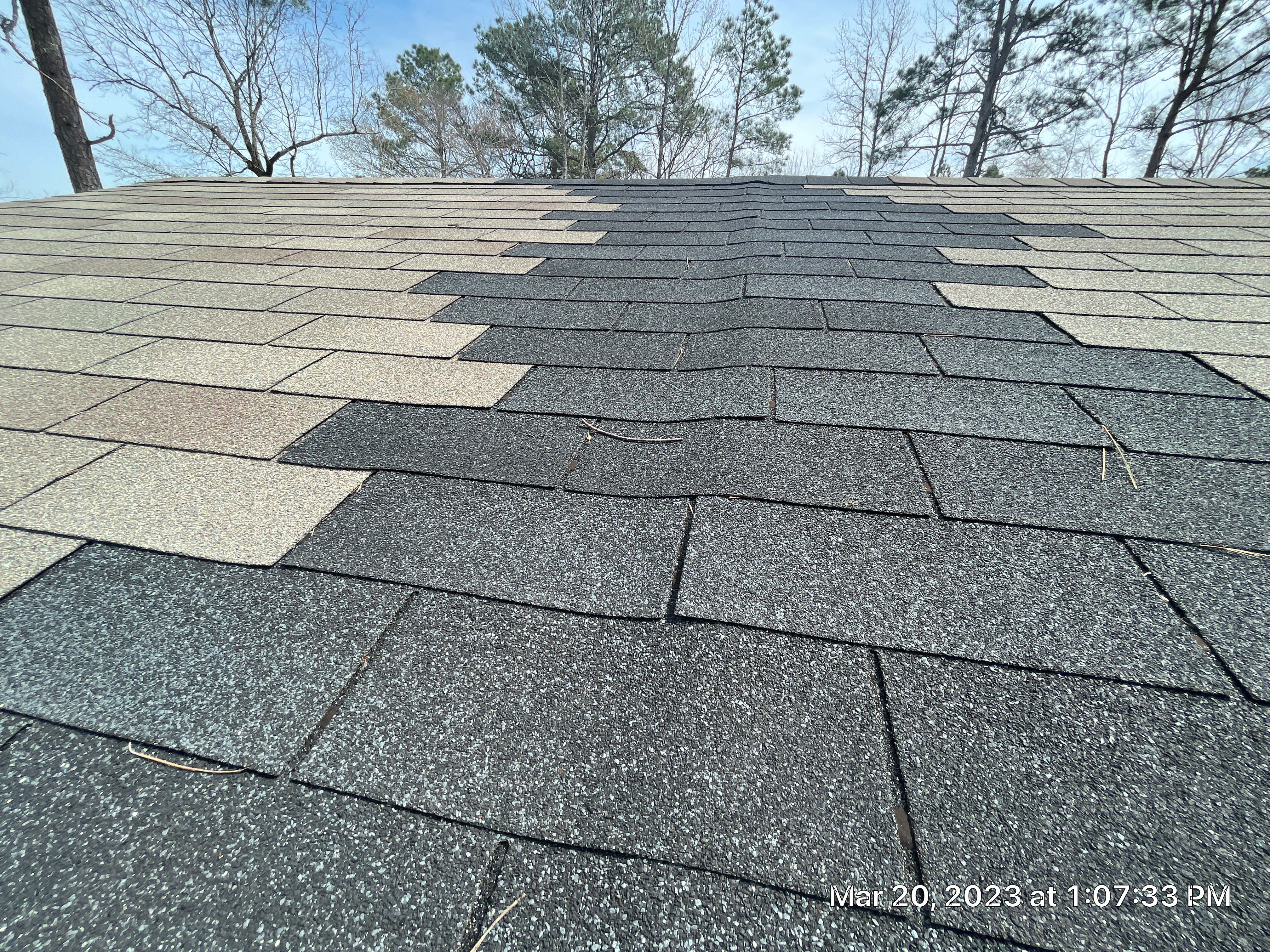 Residential Roofing Installation using 26 Gauge Colored Panels by Hostetler Roofing
