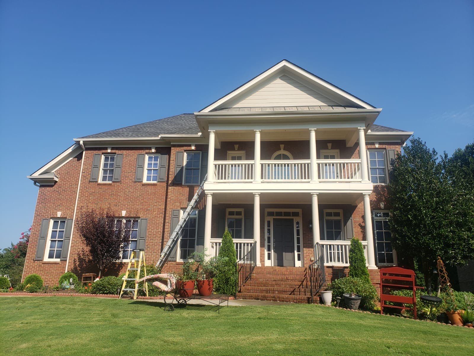 Exterior Trim and Siding Painting for Cumming Red Brick Home by Swift Home Renovations