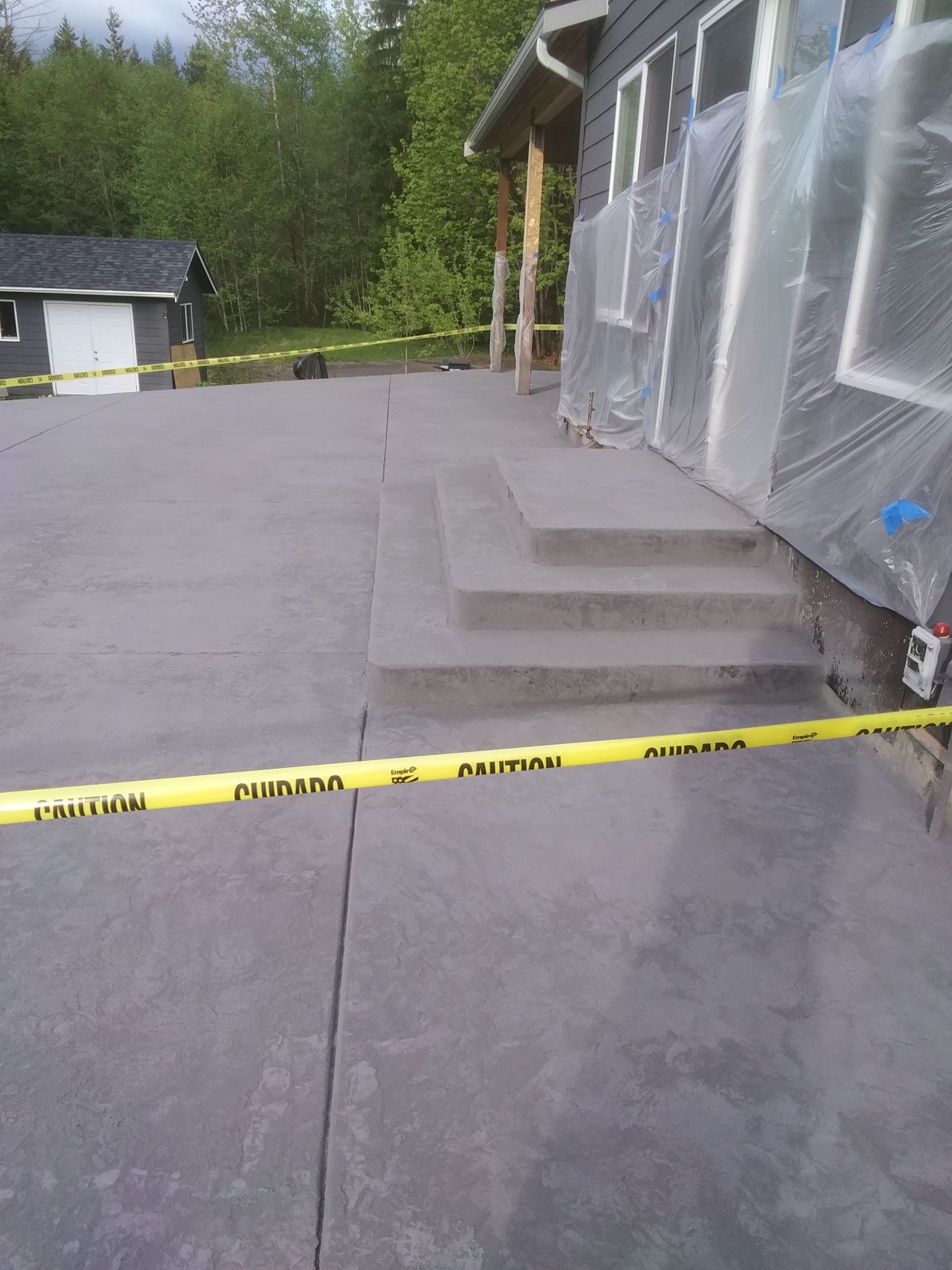 Ty | Concrete Patio by Jireh Asphalt & Concrete Inc 