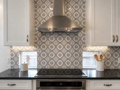 Stone Oak San Antonio Kitchen Remodel Featuring Custom White Cabinetry & Expanded Island