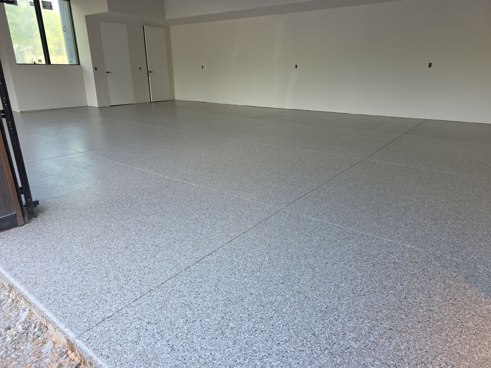 Garage Transformation using Pebble Beach by Croc Coatings, LLC