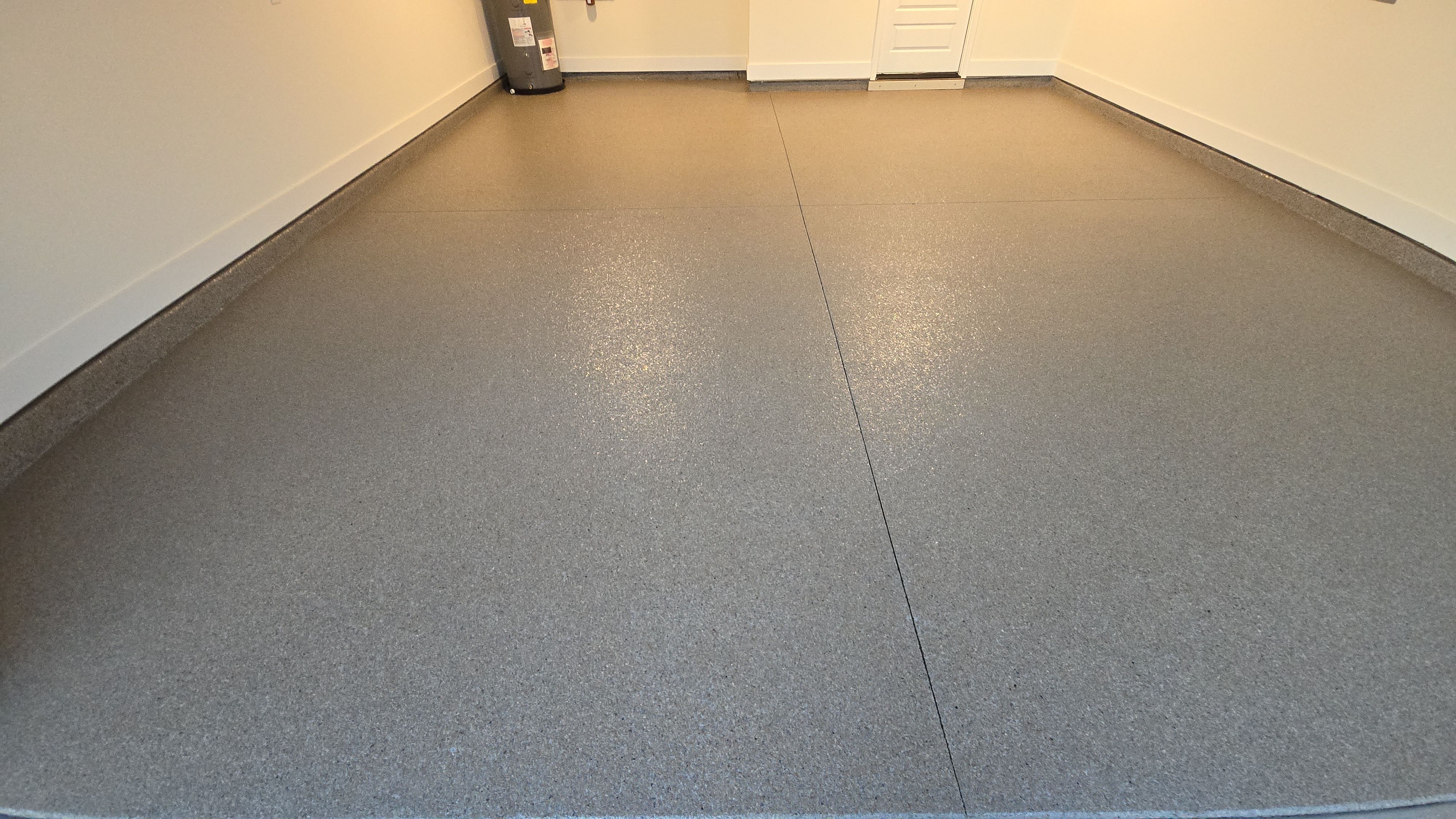 Garage, Back Porch, and Patio using Obsidian by Elite Floor Solutions