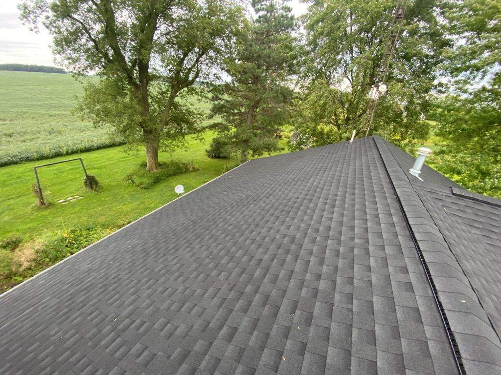 Storm damage roof replacement by Nitro Roofing and Construction
