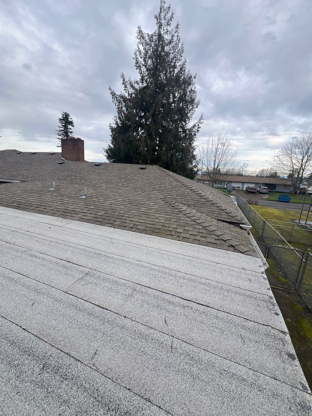 Residential Roofing Installation using IKO Dynasty (Color: Granite Black) by Orezona Building & Roofing Company, Inc.