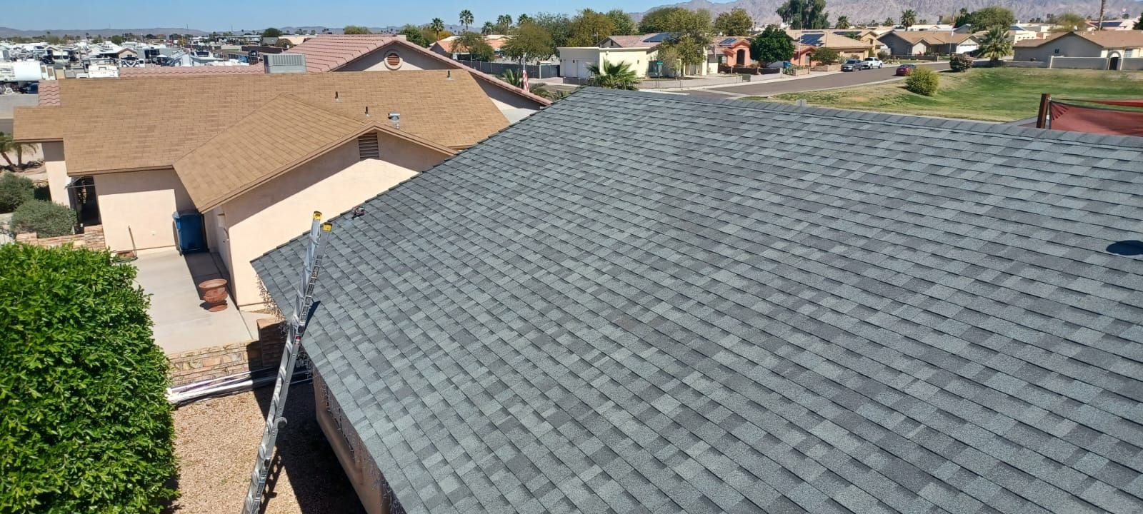 Estate Gray Shingles by Reimagine Roofing