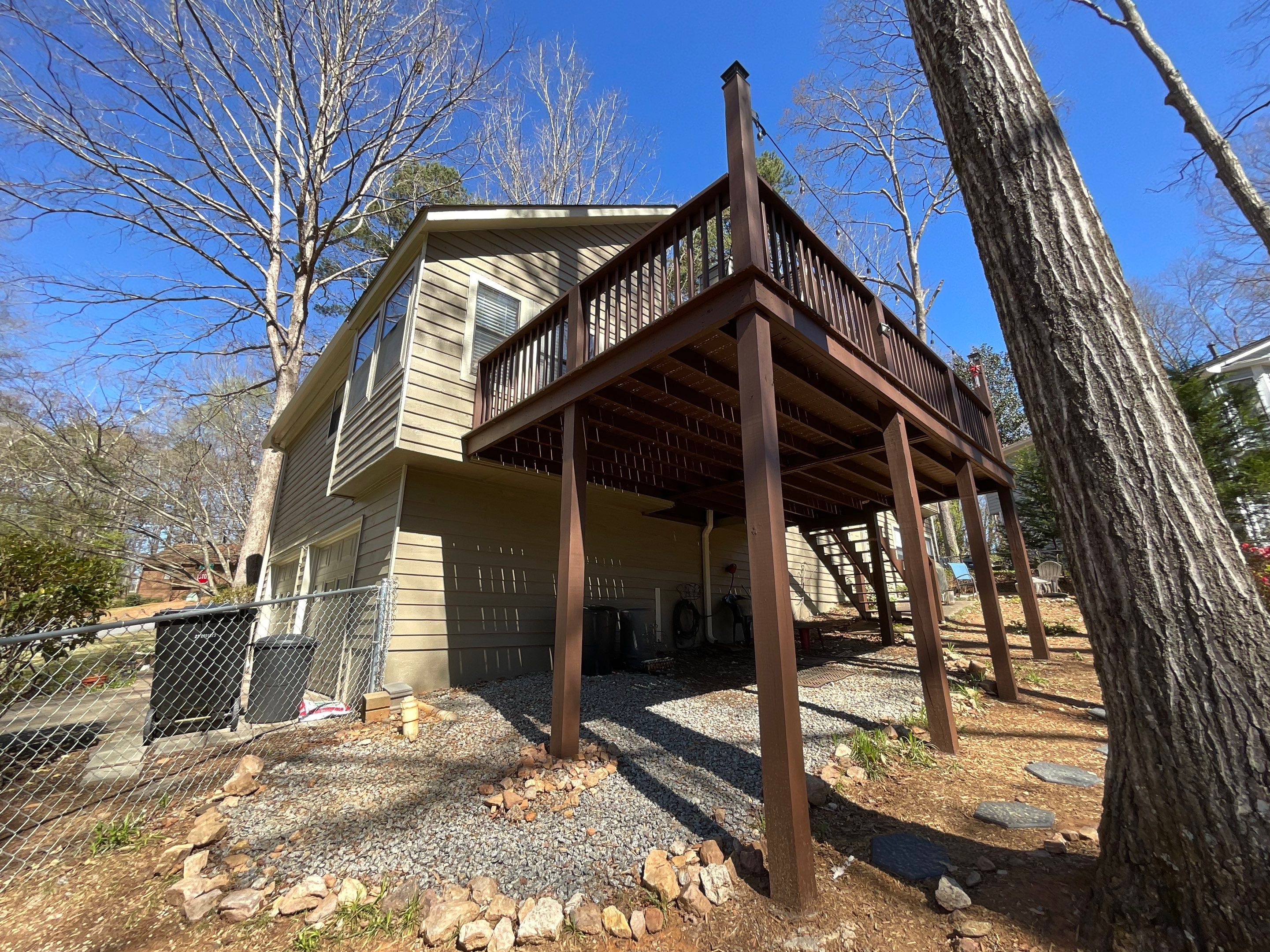 Exterior Painting and Deck Refinishing for an Acworth Residence by Swift Home Renovations