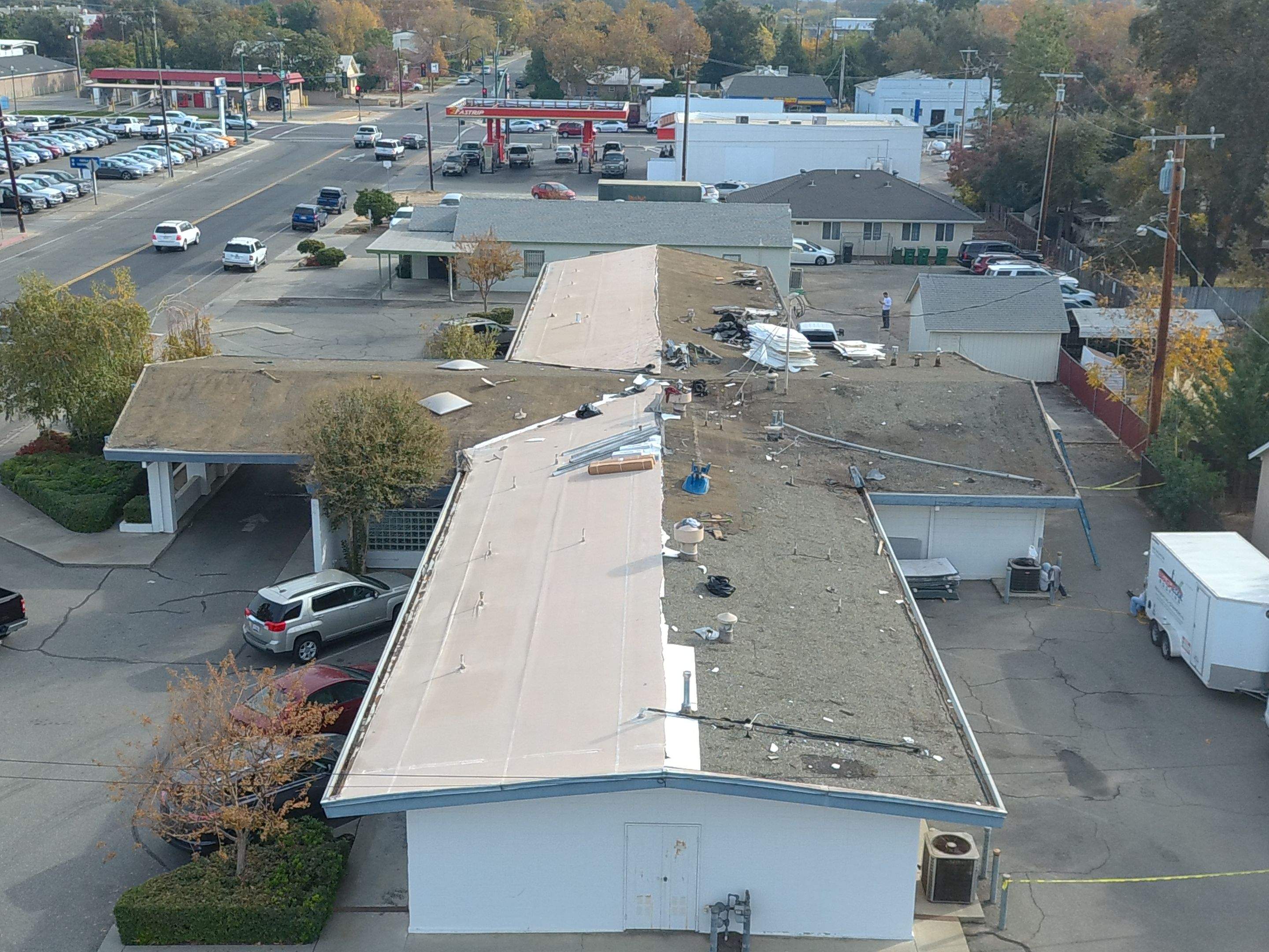 Spray foam and coatings using Conklin Benchmark/PUMA XL coatings and spray foam by Straight Edge Roofing Inc